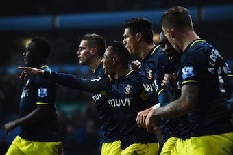 BIRMINGHAM, ENGLAND - NOVEMBER 24:  Nathaniel Clyne of Southampton (3L) celebrates with team mates as he scores their first and equalising goal during the Barclays Premier League match between Aston Villa and Southampton at Villa Park on November 24, 2014