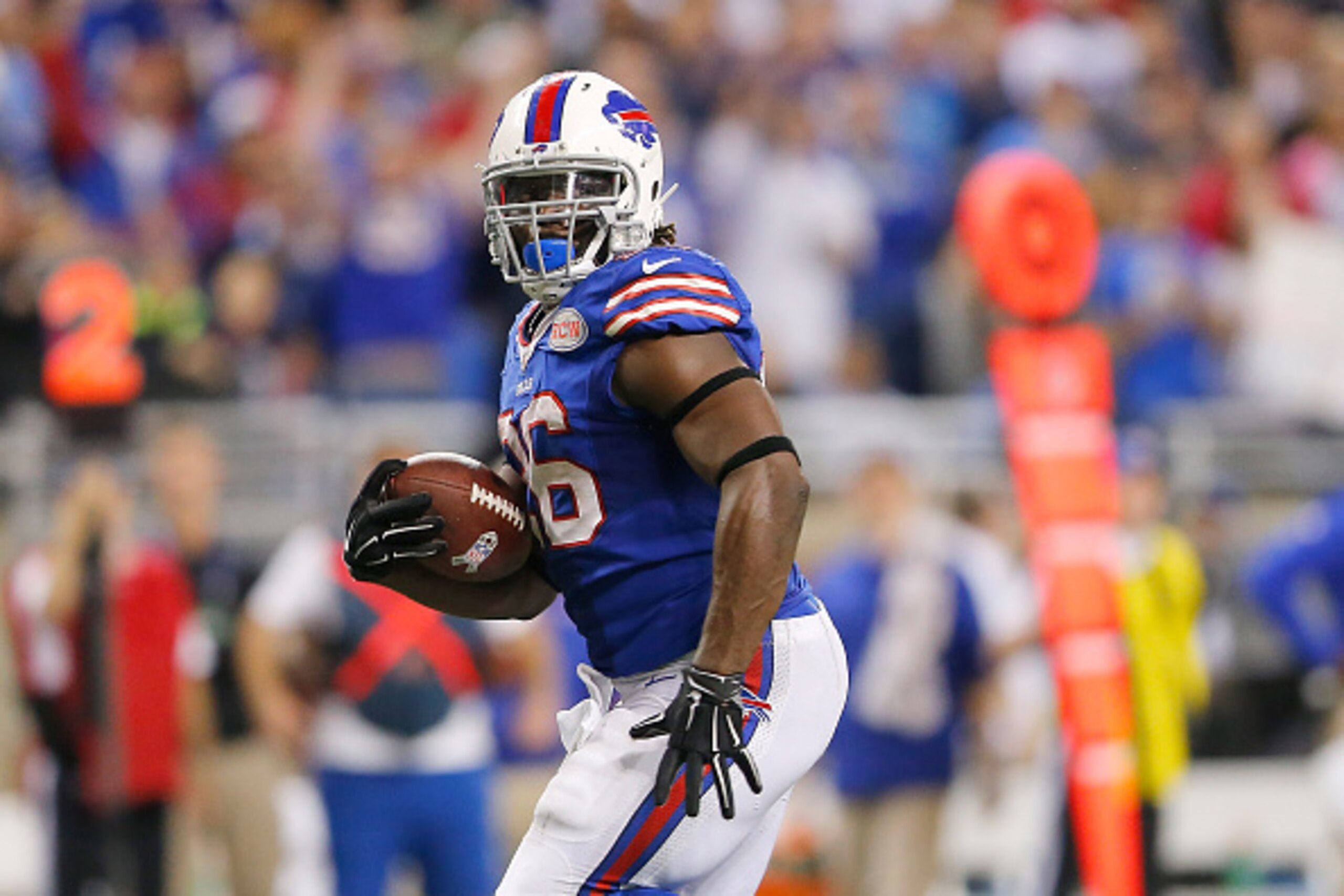 DETROIT, MI - NOVEMBER 24: Anthony Dixon #26 of the Buffalo Bills scores a 30 yard touchdown in the fourth quarter while playing the New York Jets at Ford Field on November 24 , 2014 in Detroit, Michigan. (Photo by Leon Halip/Getty Images)