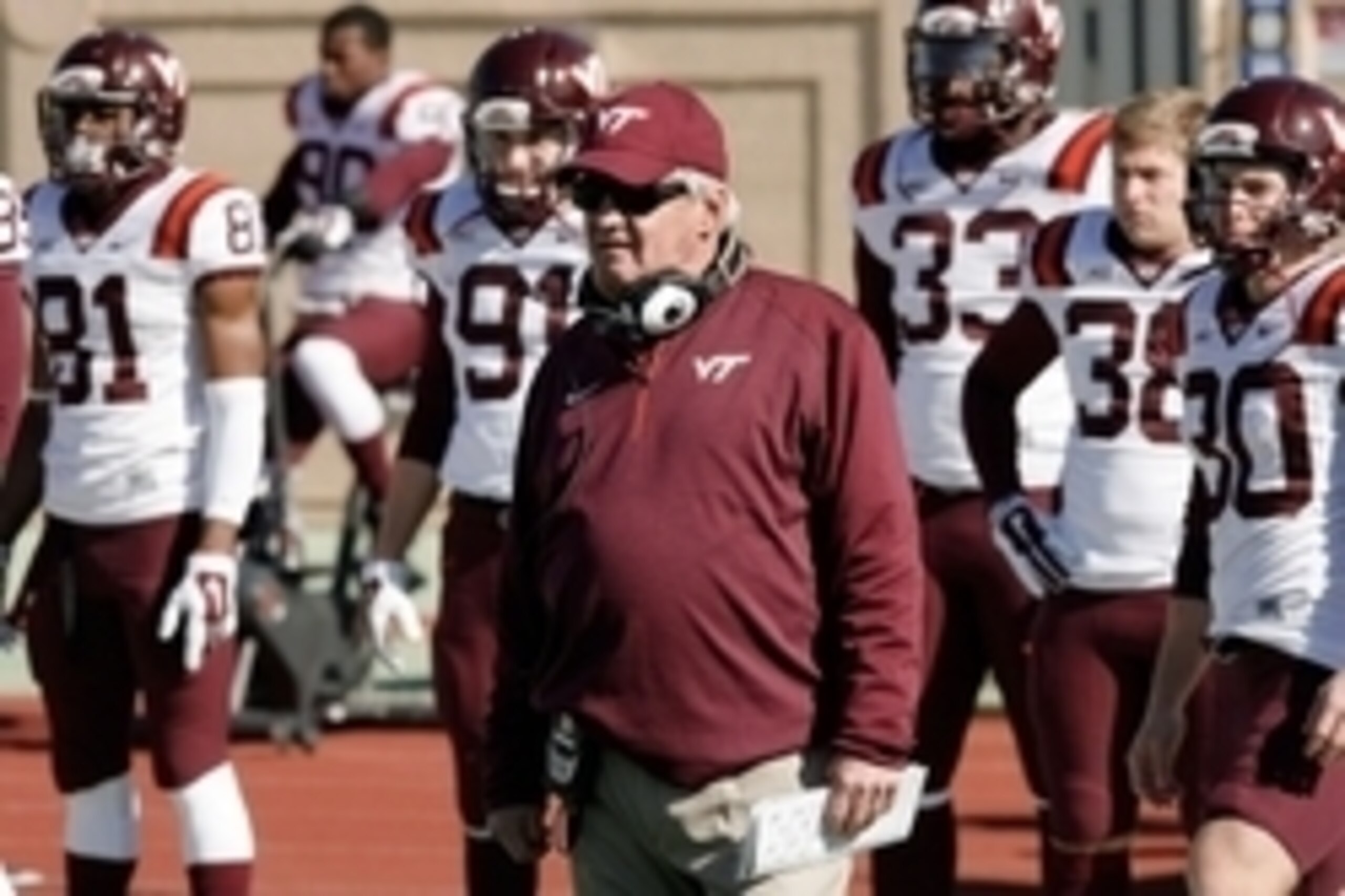 Nov 15, 2014; Durham, NC, USA; Virginia Tech Hokies head coach Frank Beamer (C) watches the coin toss from the sidelines prior to the game against the Duke Blue Devils at Wallace Wade Stadium. Mandatory Credit: Mark Dolejs-USA TODAY Sports