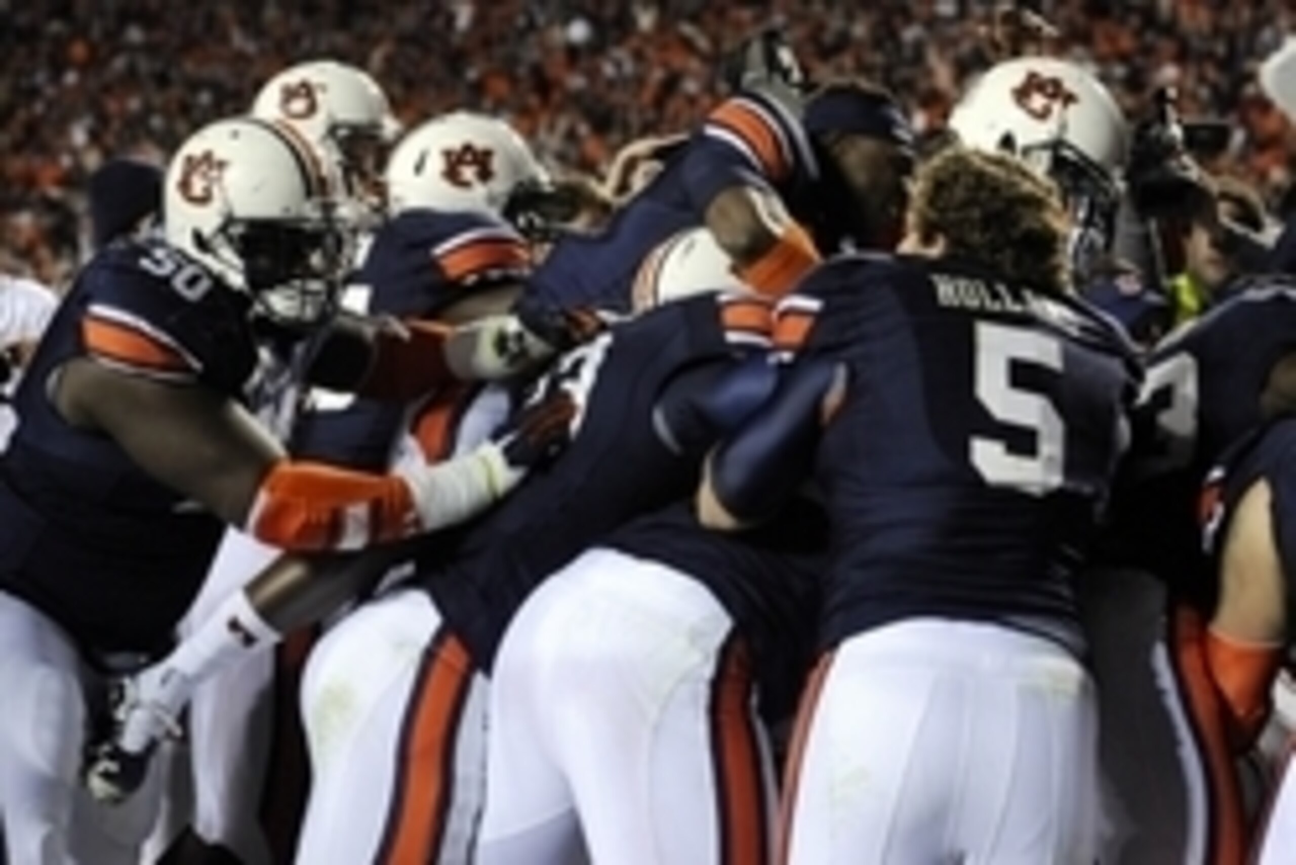 Nov 30, 2013; Auburn, AL, USA; Then Auburn Tigers celebrate after defeating the Alabama Crimson Tide at Jordan Hare Stadium. Auburn Tigers won 34-28. Mandatory Credit: Shanna Lockwood-USA TODAY Sports