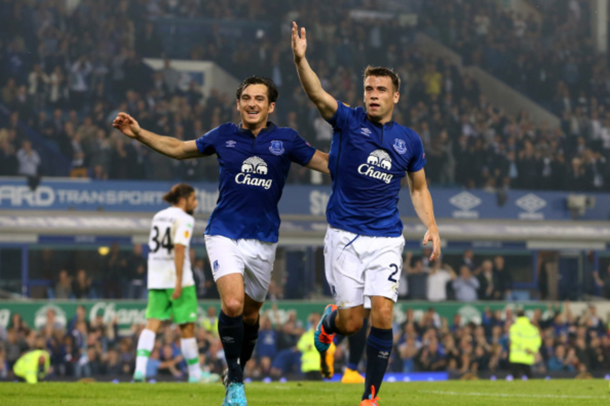 LIVERPOOL, ENGLAND - SEPTEMBER 18:  Seamus Coleman (R) of Everton celebrates with teammate Leighton Baines of Everton after scoring his team's second goal during the UEFA Europa League Group H match between Everton and VFL Wolfsburg on September 18, 2014 