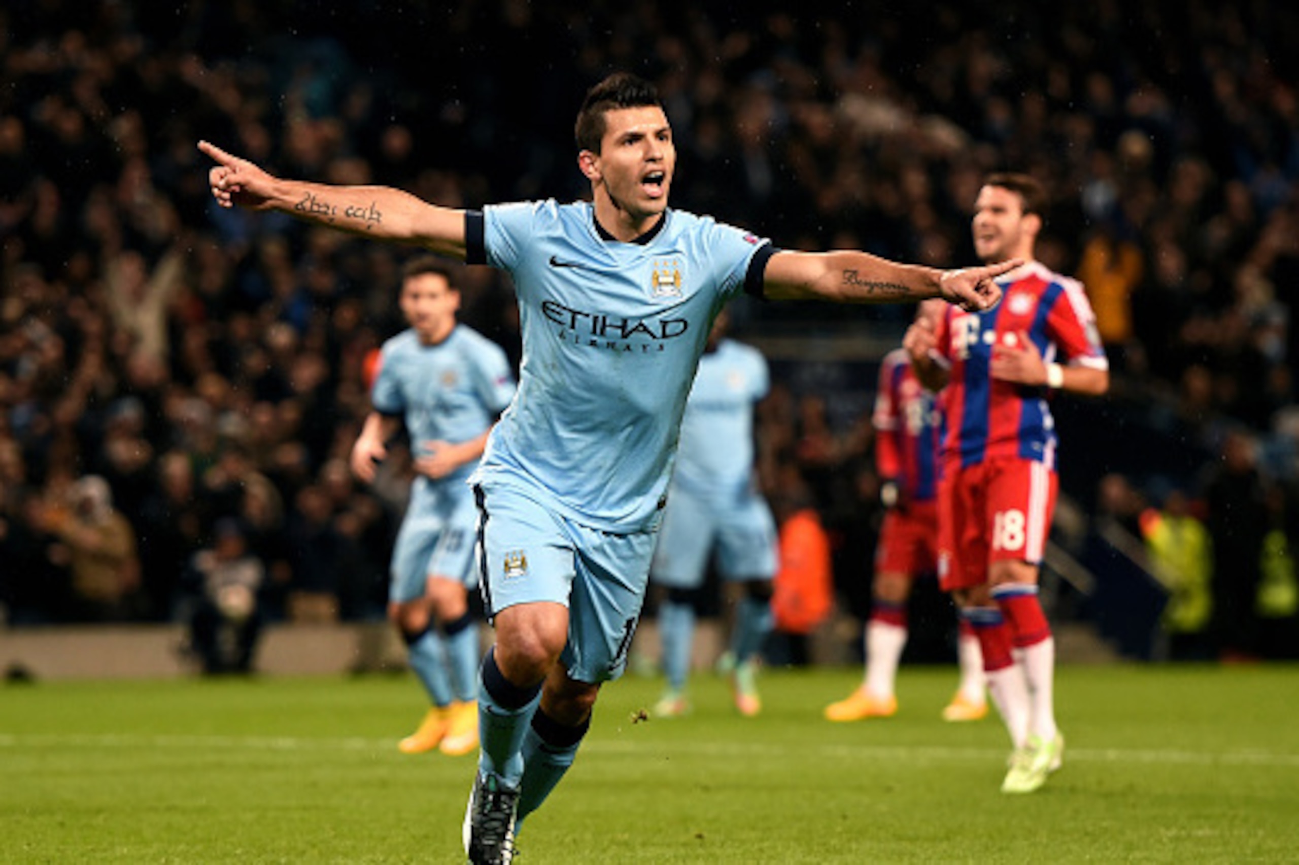 MANCHESTER, ENGLAND - NOVEMBER 25:  Sergio Aguero of Manchester City celebrates after scoring the opening goal from the penalty spot during the UEFA Champions League Group E match between Manchester City and FC Bayern Muenchen at the Etihad Stadium on Nov