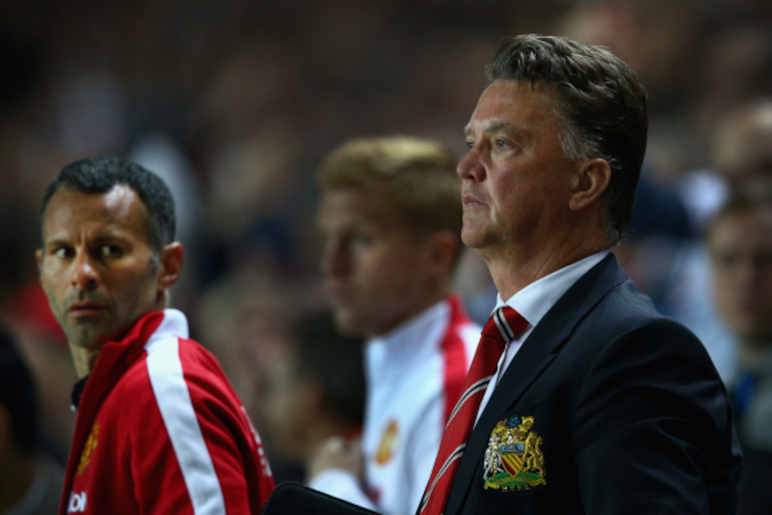 MILTON KEYNES, ENGLAND - AUGUST 26:  Manager Louis van Gaal of Manchester United looks dejected with assistant Ryan Giggs (L) after the Capital One Cup second round match between MK Dons and Manchester United at Stadium mk on August 26, 2014 in Milton Key