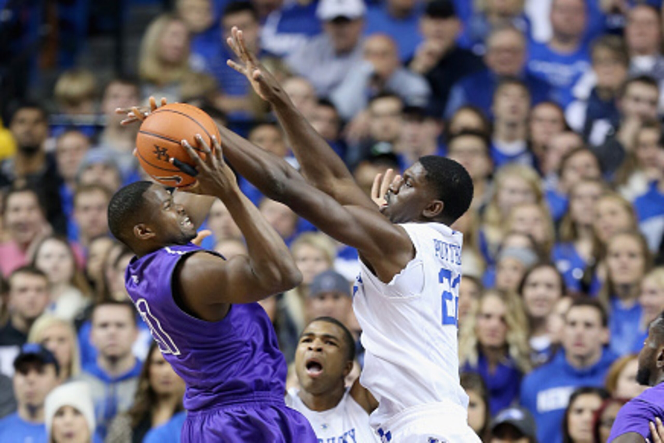 LEXINGTON, KY - NOVEMBER 14:  Alex Poythress #22 of the Kentucky Wildcats defends the shot of Jerome Garrison #21 of the Grand Canyon Antelopes at Rupp Arena on November 14, 2014 in Lexington, Kentucky.  (Photo by Andy Lyons/Getty Images)