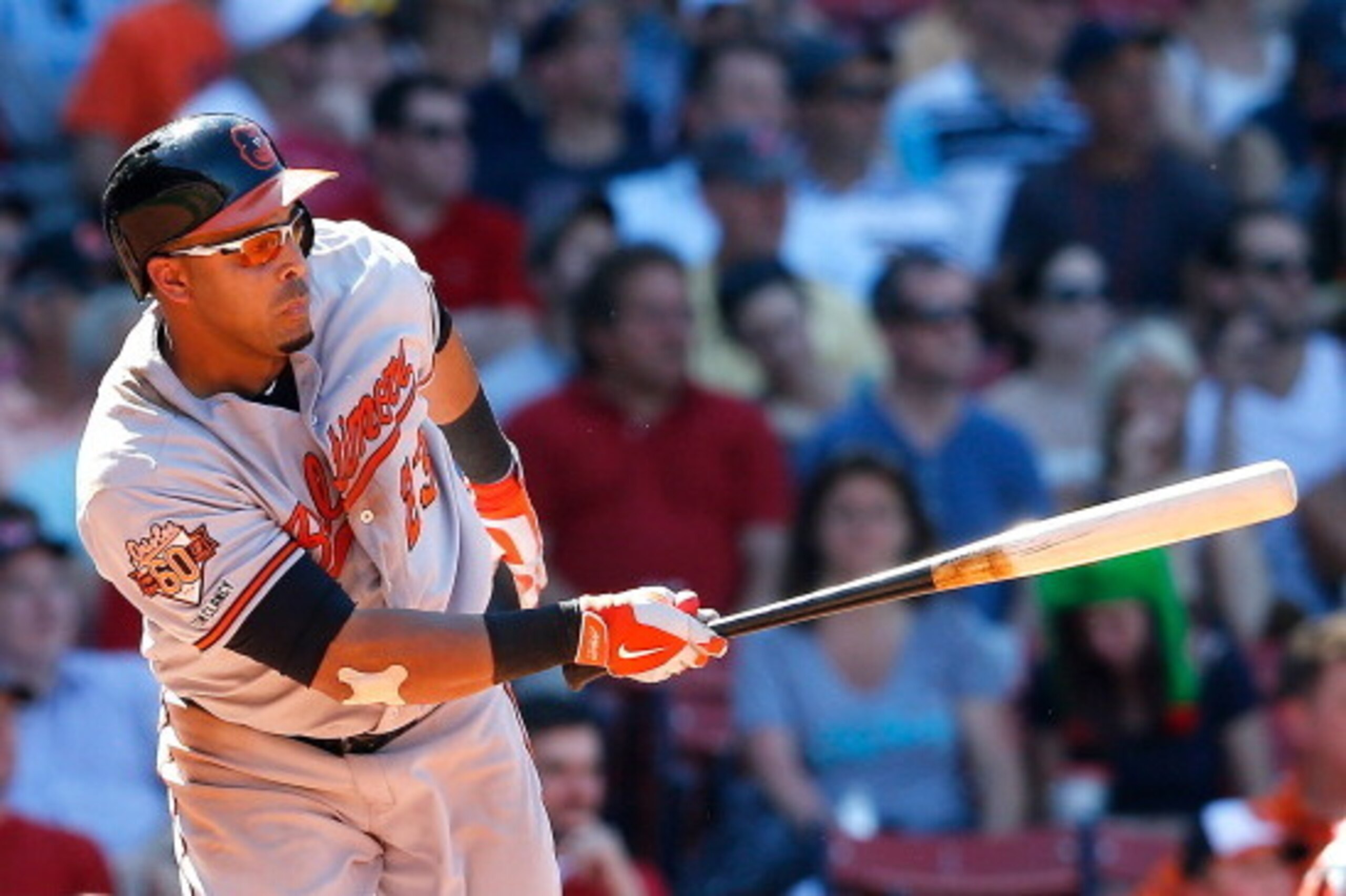 BOSTON, MA - JULY 6:  Nelson Cruz #23 of the Baltimore Orioles singles in a run against the Boston Red Sox in the seventh inning at Fenway Park on July 6, 2014 in Boston, Massachusetts.  (Photo by Jim Rogash/Getty Images)