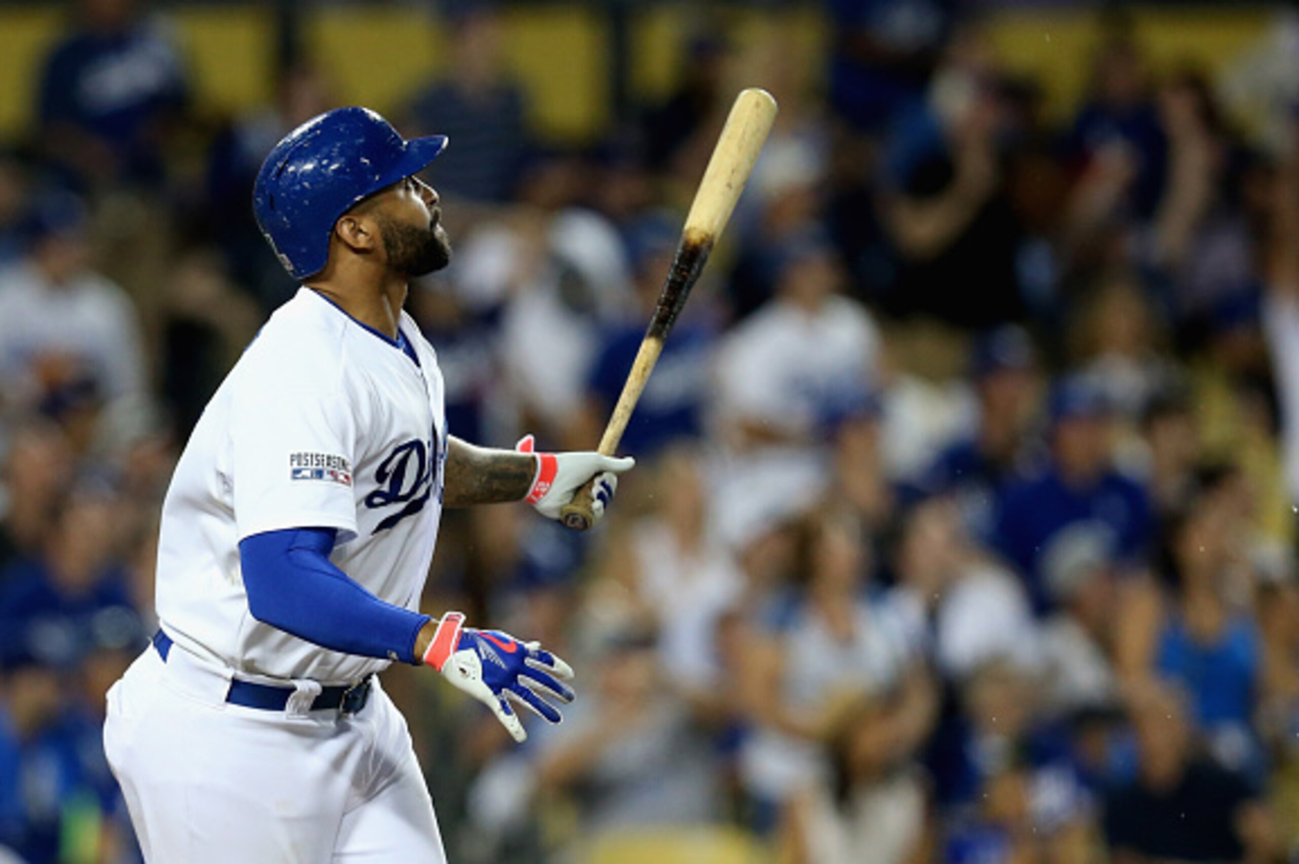 LOS ANGELES, CA - OCTOBER 04:  Matt Kemp #27 of the Los Angeles Dodgers watches his solo homerun to lead off and take a 3-2 lead in the eighth inning of Game Two of the National League Division Series against the St. Louis Cardinals at Dodger Stadium on O