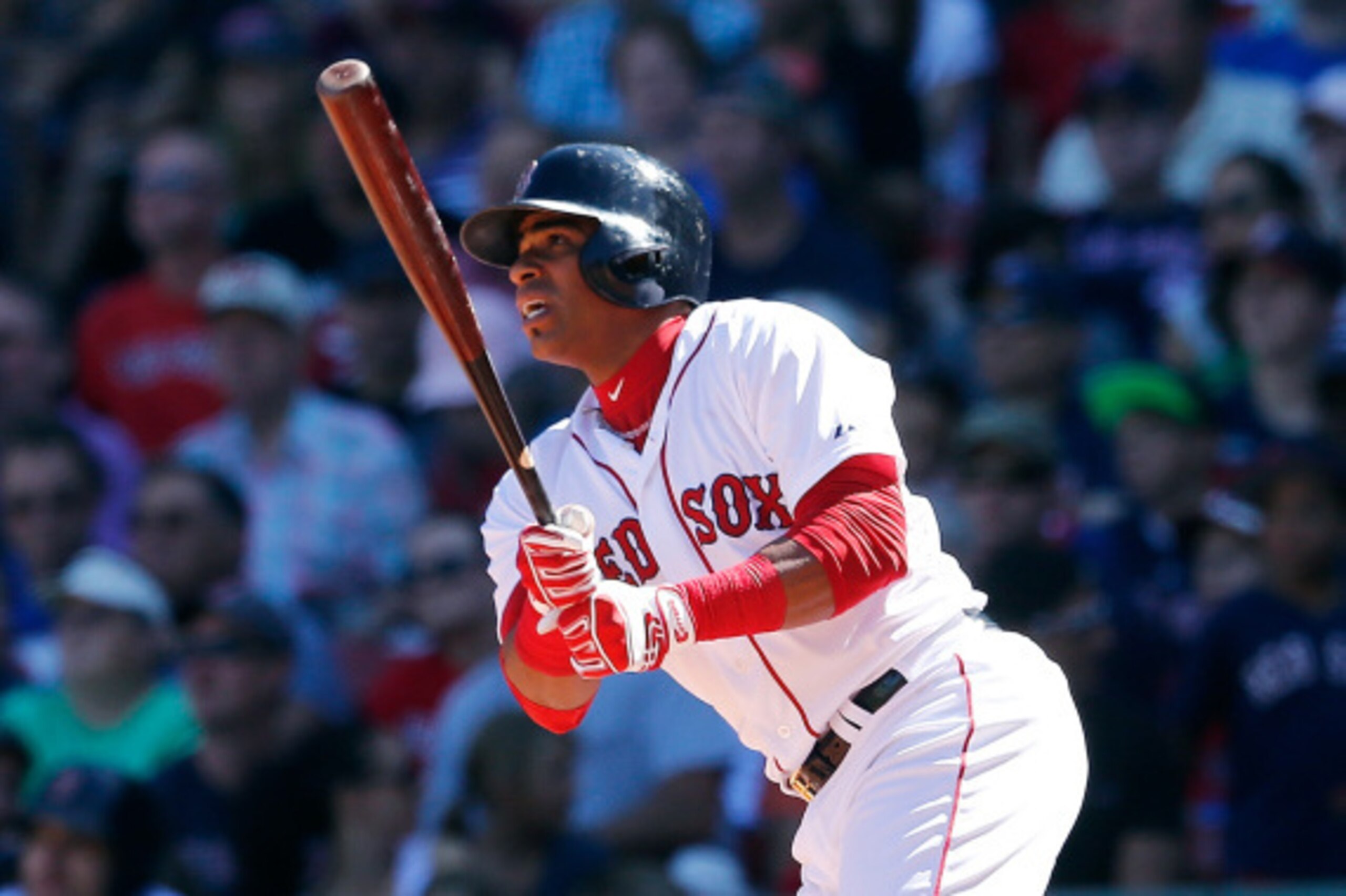 BOSTON, MA - SEPTEMBER 7:  Yoenis Cespedes #52 of the Boston Red Sox watches the flight of his ball against the Toronto Blue Jays in the third inning at Fenway Park on September 7, 2014 in Boston, Massachusetts.  (Photo by Jim Rogash/Getty Images)