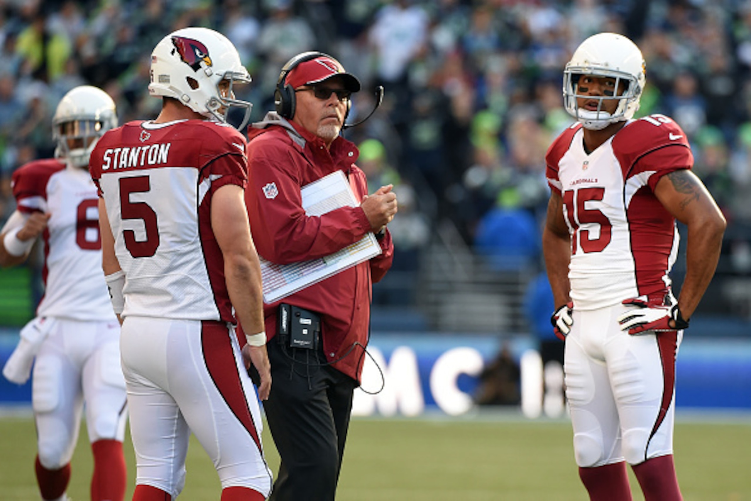 SEATTLE, WA - NOVEMBER 23:  Drew Stanton #5 and Michael Floyd #15 of the Arizona Cardinals talk with head coach Bruce Arians against the Seattle Seahawks during their game at CenturyLink Field on November 23, 2014 in Seattle, Washington.  (Photo by Steve 