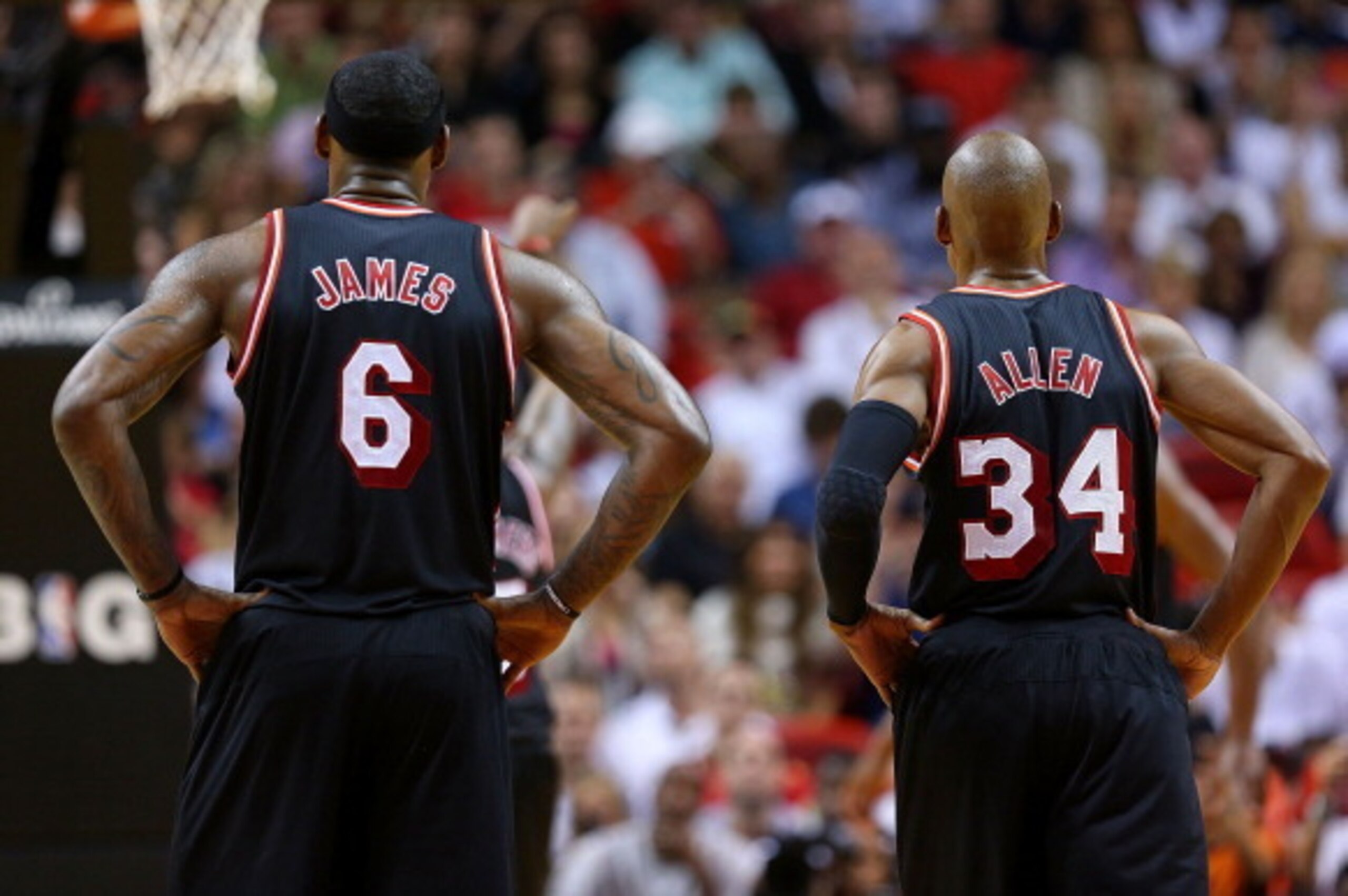MIAMI, FL - JANUARY 26: LeBron James #6 and Ray Allen #34 of the Miami Heat look on during a game against the San Antonio Spurs at American Airlines Arena on January 26, 2014 in Miami, Florida. NOTE TO USER: User expressly acknowledges and agrees that, by