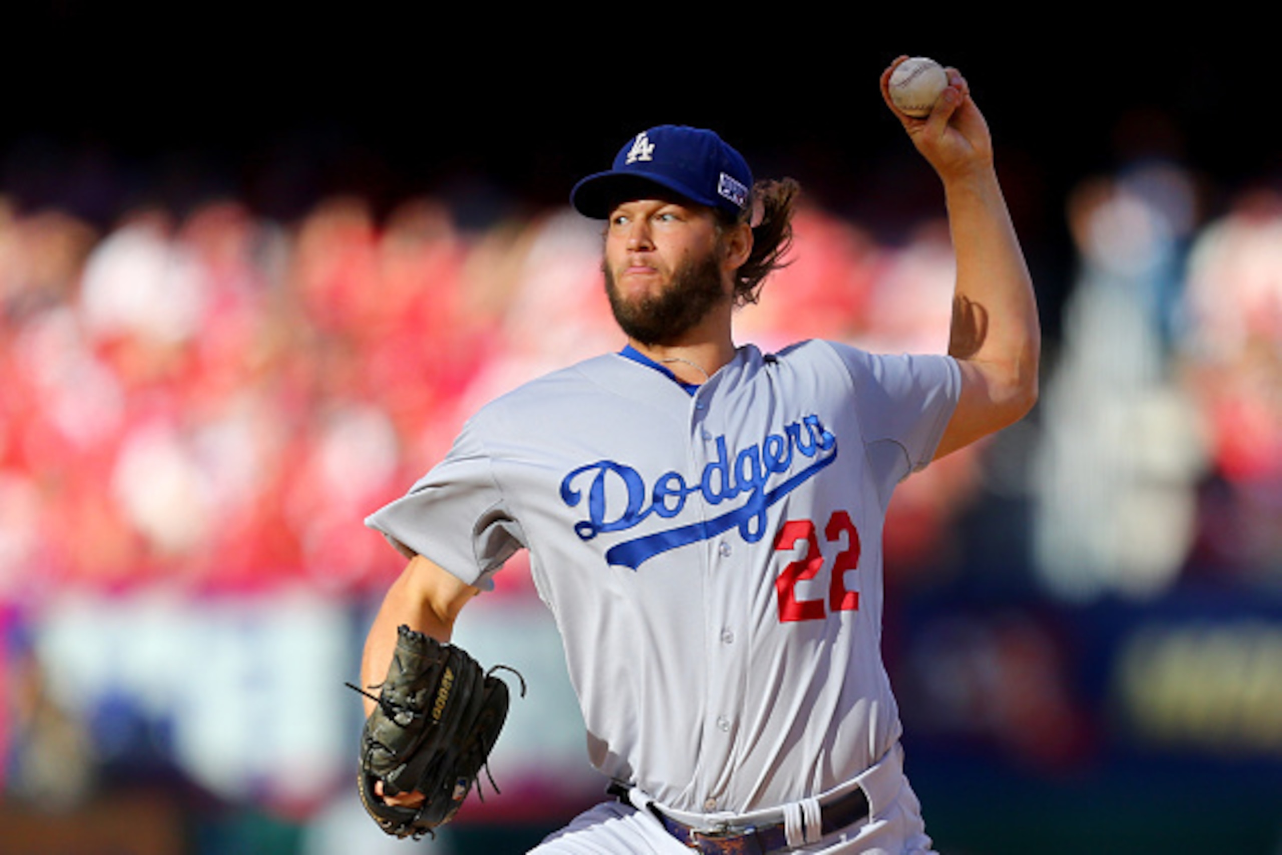 ST LOUIS, MO - OCTOBER 07:  Clayton Kershaw #22 of the Los Angeles Dodgers pitches in the first inning against the St. Louis Cardinals in Game Four of the National League Divison Series at Busch Stadium on October 7, 2014 in St Louis, Missouri.  (Photo by
