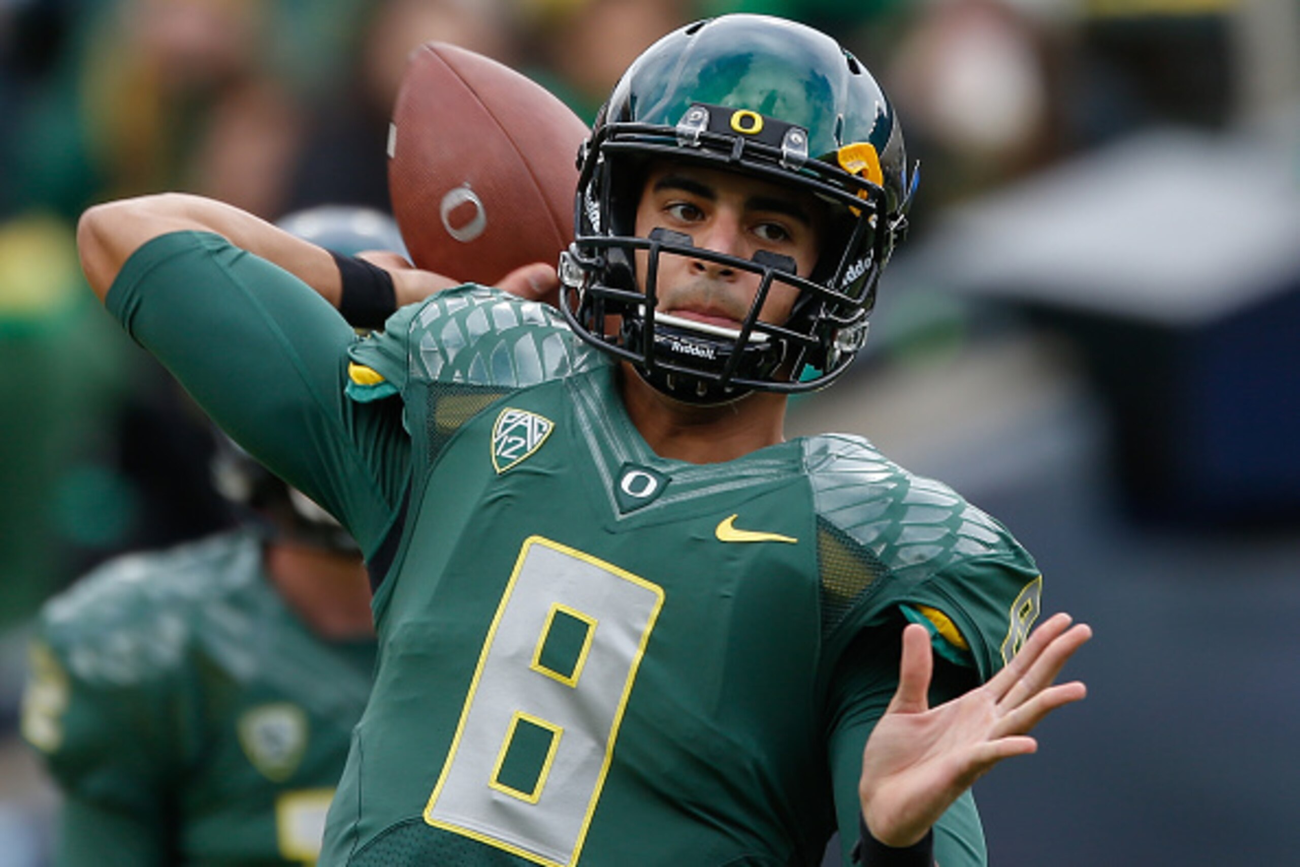 EUGENE, OR - NOVEMBER 22: Quarterback Marcus Mariota #8 of the Oregon Ducks warms up prior to the game against the Colorado Buffaloes at Autzen Stadium on November 22, 2014 in Eugene, Oregon. (Photo by Otto Greule Jr/Getty Images) EUGENE, OR - NOVEMBER 22: Quarterback Marcus Mariota #8 of the Oregon Ducks warms up prior to the game against the Colorado Buffaloes at Autzen Stadium on November 22, 2014 in Eugene, Oregon. (Photo by Otto Greule Jr/Getty Images)