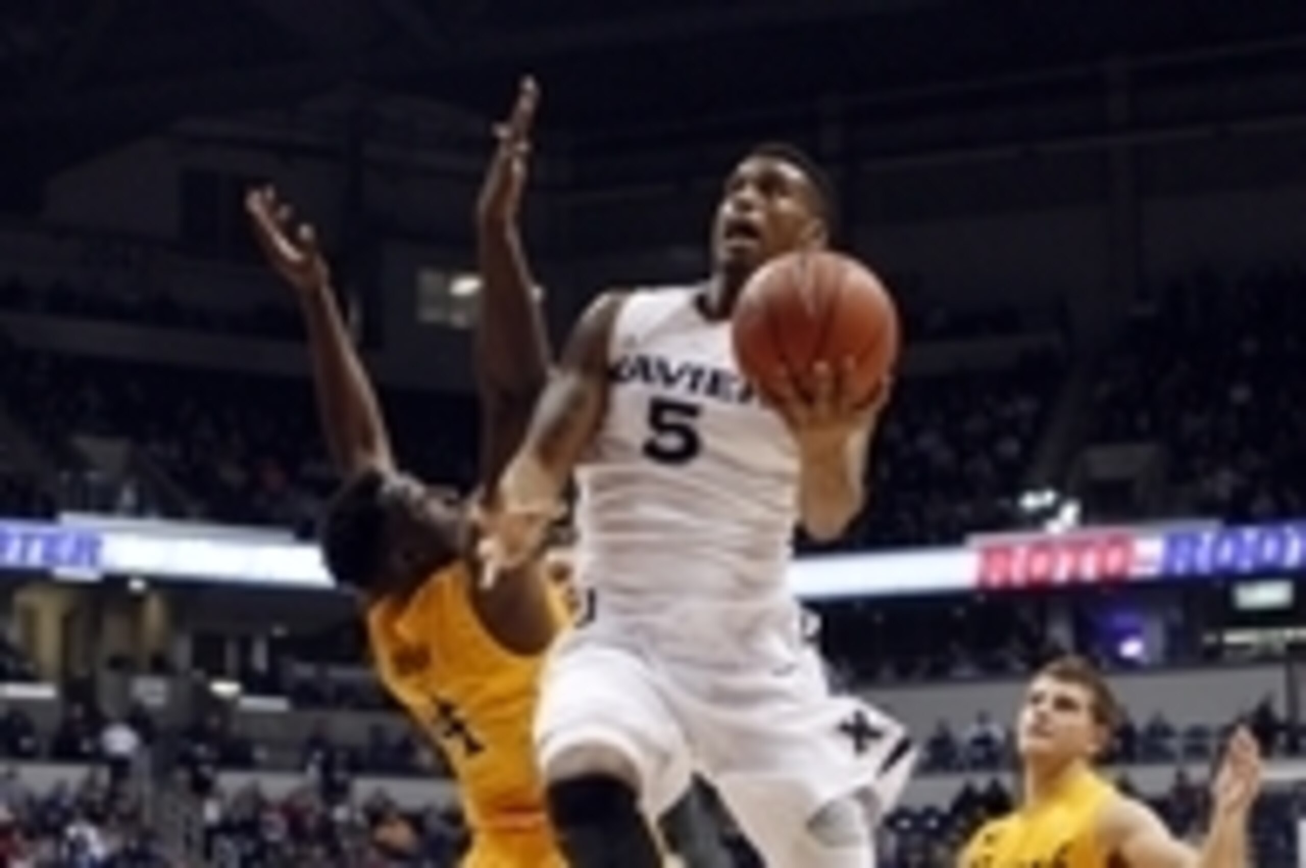 Nov 18, 2014; Cincinnati, OH, USA; Xavier Musketeers forward Trevon Bluiett (5) drives to the basket during the first half against the Long Beach State 49ers at the Cintas Center. Mandatory Credit: Frank Victores-USA TODAY Sports