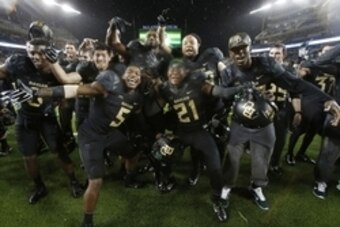 Nov 22, 2014; Waco, TX, USA; Baylor Bears players celebrate after the game against the Oklahoma State Cowboys at McLane Stadium. Baylor beat Oklahoma State 49-28. Mandatory Credit: Tim Heitman-USA TODAY Sports
