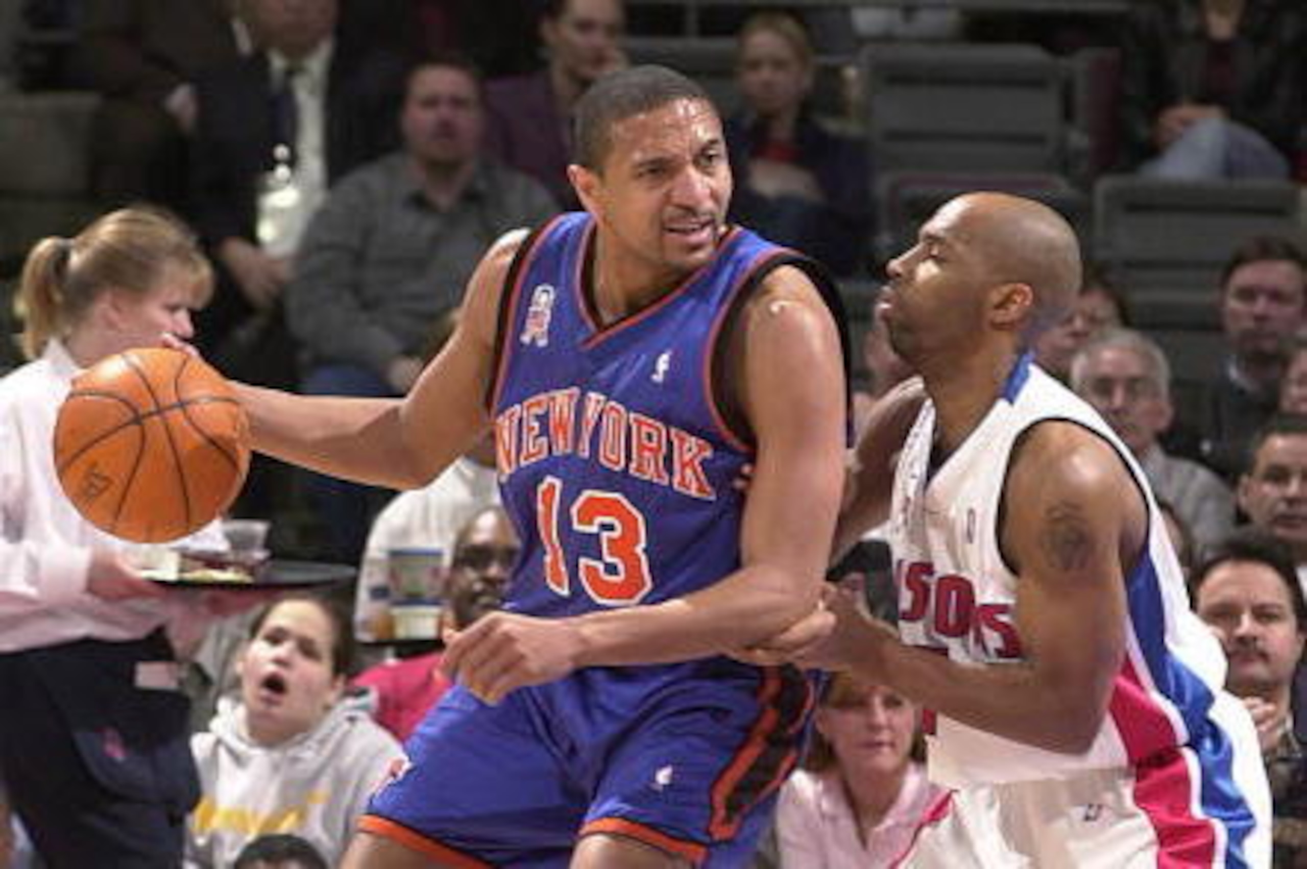 27 Mar 2002: Mark Jackson #13 of the New York Knicks posts up Chucky Atkins #7 of the Detroit Pistons in a game at The Palace of Auburn Hills in Auburn Hills, Michigan.  DIGITAL IMAGE. NOTE TO USER: User expressly acknowledges and agrees that, by download