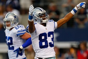 ARLINGTON, TX - OCTOBER 19:  Terrance Williams #83 of the Dallas Cowboys reacts after scoring a touchdown against the New York Giants in the first half at AT&T Stadium on October 19, 2014 in Arlington, Texas.  (Photo by Wesley Hitt/Getty Images)