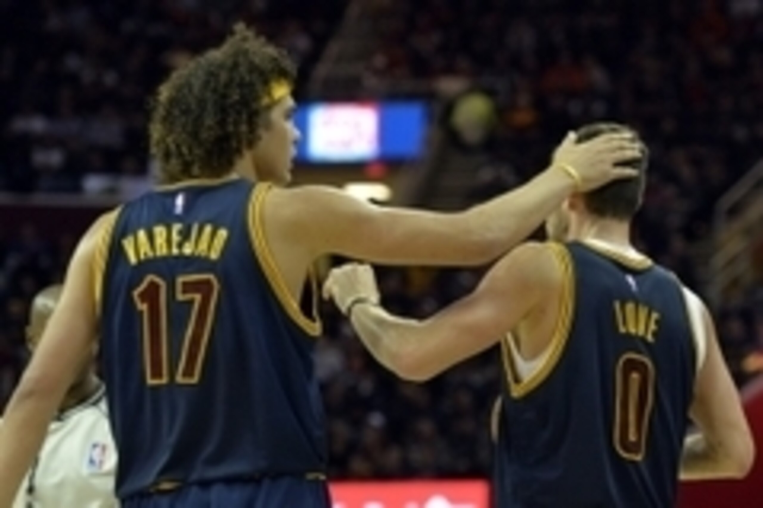 Oct 30, 2014; Cleveland, OH, USA; Cleveland Cavaliers center Anderson Varejao (17) reacts with forward Kevin Love (0) during a 95-90 loss to the New York Knicks at Quicken Loans Arena. Mandatory Credit: David Richard-USA TODAY Sports