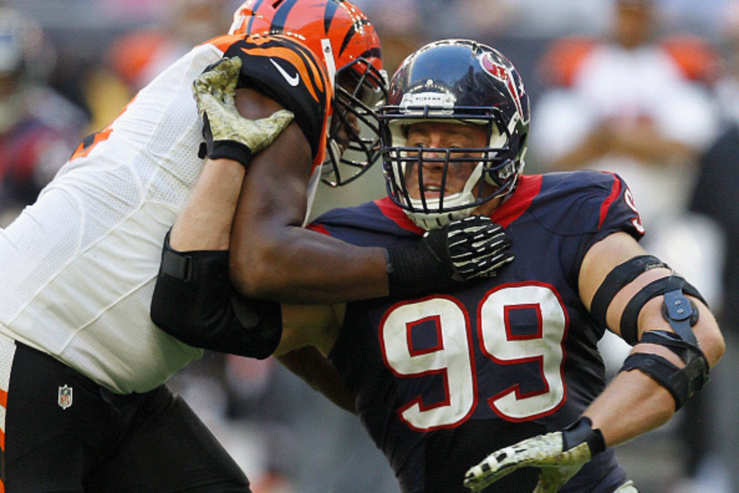 HOUSTON, TX - NOVEMBER 23: J.J. Watt #99 of the Houston Texans battles with Marshall Newhouse #74 of the Cincinnati Bengals at NRG Stadium on November 23, 2014 in Houston, Texas. (Photo by Bob Levey/Getty Images) HOUSTON, TX - NOVEMBER 23: J.J. Watt #99 of the Houston Texans battles with Marshall Newhouse #74 of the Cincinnati Bengals at NRG Stadium on November 23, 2014 in Houston, Texas. (Photo by Bob Levey/Getty Images)