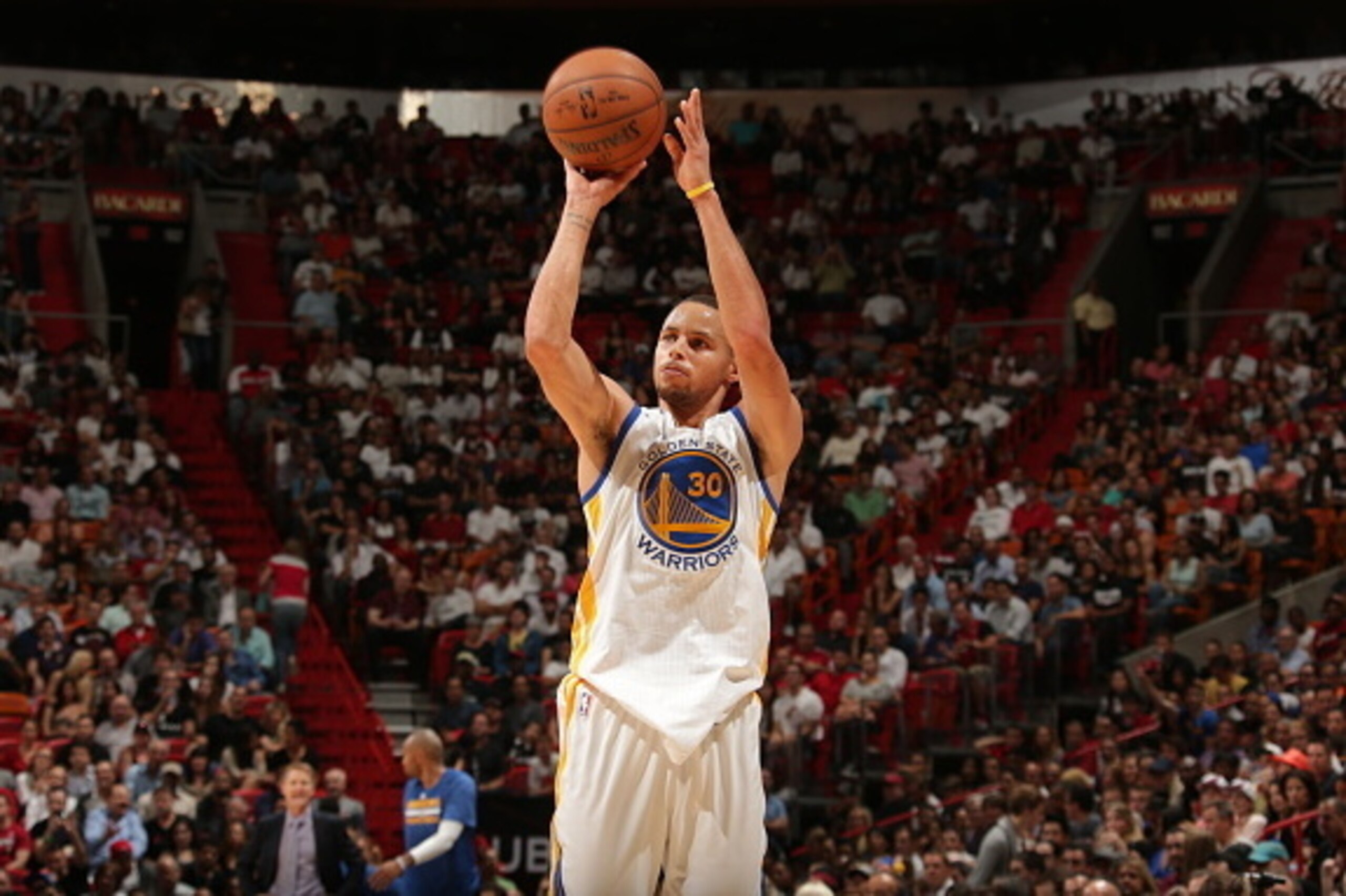 MIAMI, FL - NOVEMBER 25:  Stephen Curry #30 of the Golden State Warriors shoots against the Miami Heat on November 25, 2014 at American Airlines Arena in Miami, Florida.  NOTE TO USER: User expressly acknowledges and agrees that, by downloading and or usi