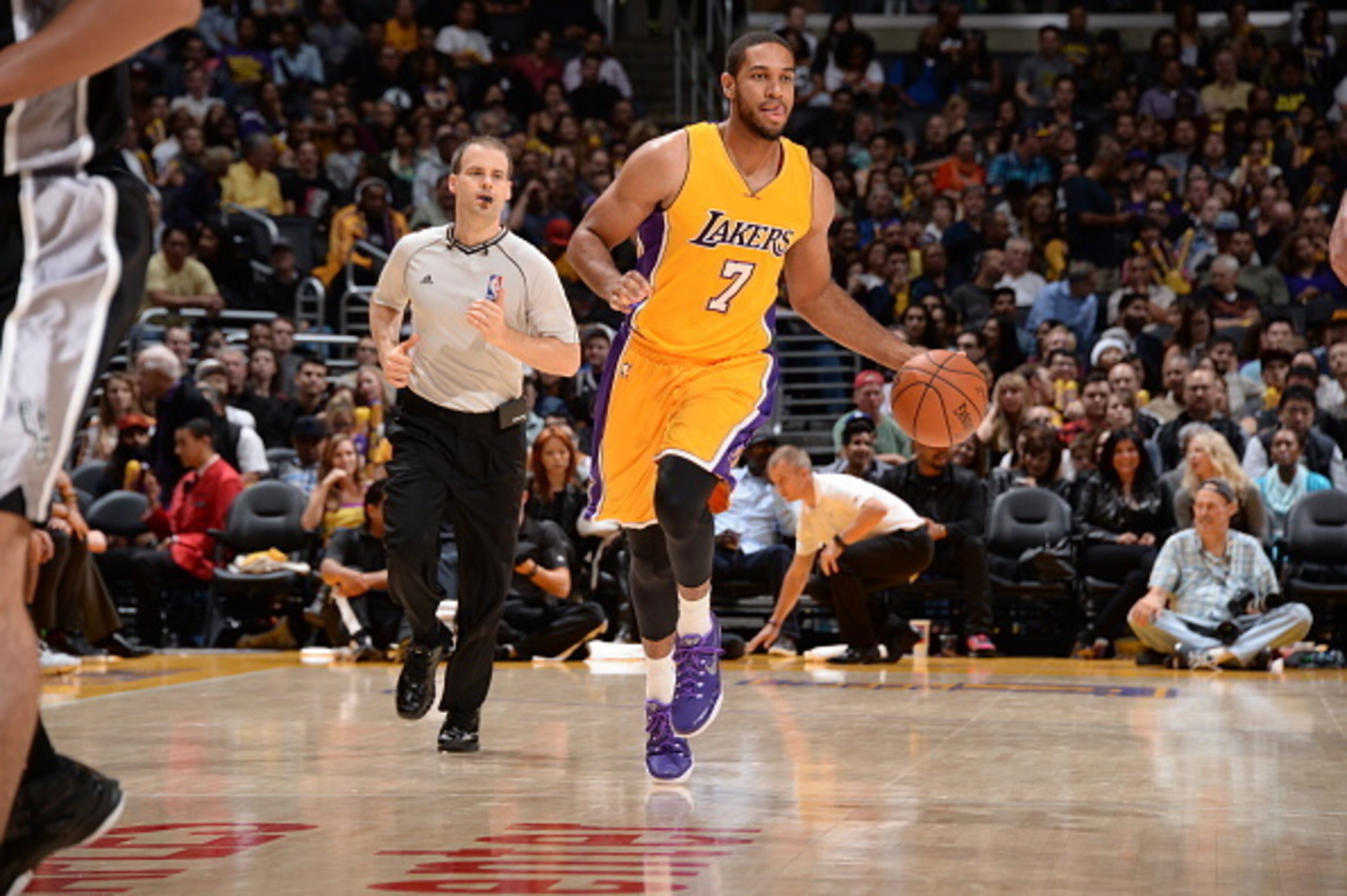 LOS ANGELES, CA - NOVEMBER 14: Xavier Henry #7 of the Los Angeles Lakers brings the ball up court against the San Antonio Spurs on November 14, 2014 at Staples Center in Los Angeles, California. NOTE TO USER: User expressly acknowledges and agrees that, LOS ANGELES, CA - NOVEMBER 14: Xavier Henry #7 of the Los Angeles Lakers brings the ball up court against the San Antonio Spurs on November 14, 2014 at Staples Center in Los Angeles, California. NOTE TO USER: User expressly acknowledges and agrees that,