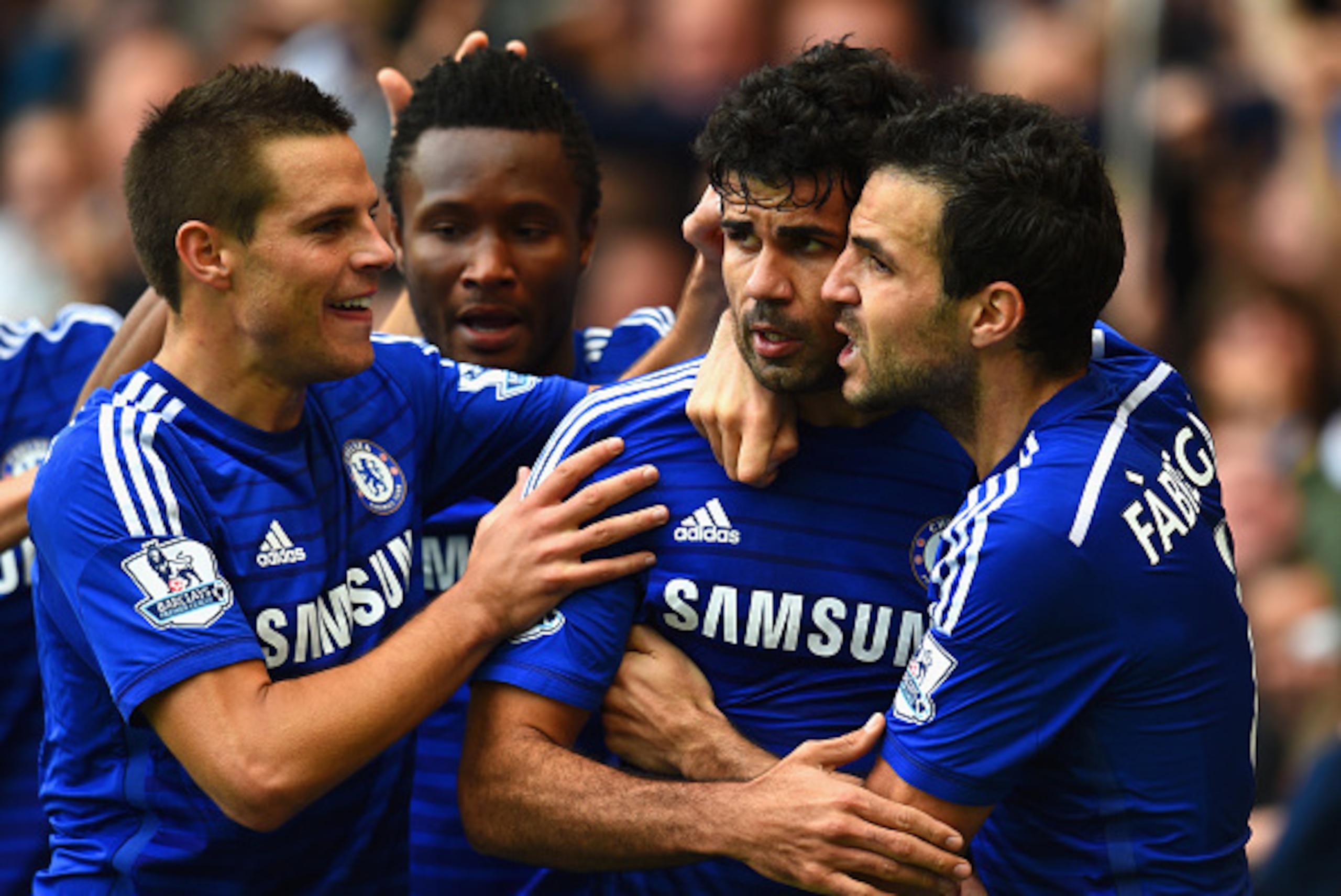 LONDON, ENGLAND - OCTOBER 05: Diego Costa of Chelsea celebrates scoring their second goal with Cesar Azpilicueta and Cesc Fabregas of Chelsea during the Barclays Premier League match between Chelsea and Arsenal at Stamford Bridge on October 4, 2014 in Lo LONDON, ENGLAND - OCTOBER 05: Diego Costa of Chelsea celebrates scoring their second goal with Cesar Azpilicueta and Cesc Fabregas of Chelsea during the Barclays Premier League match between Chelsea and Arsenal at Stamford Bridge on October 4, 2014 in Lo