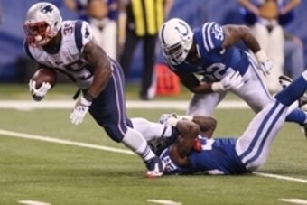 Nov 16, 2014; Indianapolis, IN, USA; New England Patriots running back Jonas Gray (35) is tackled by Indianapolis Colts cornerback Greg Toler (28) at Lucas Oil Stadium. New England defeated Indianapolis 42-20. Mandatory Credit: Brian Spurlock-USA TODAY Sp