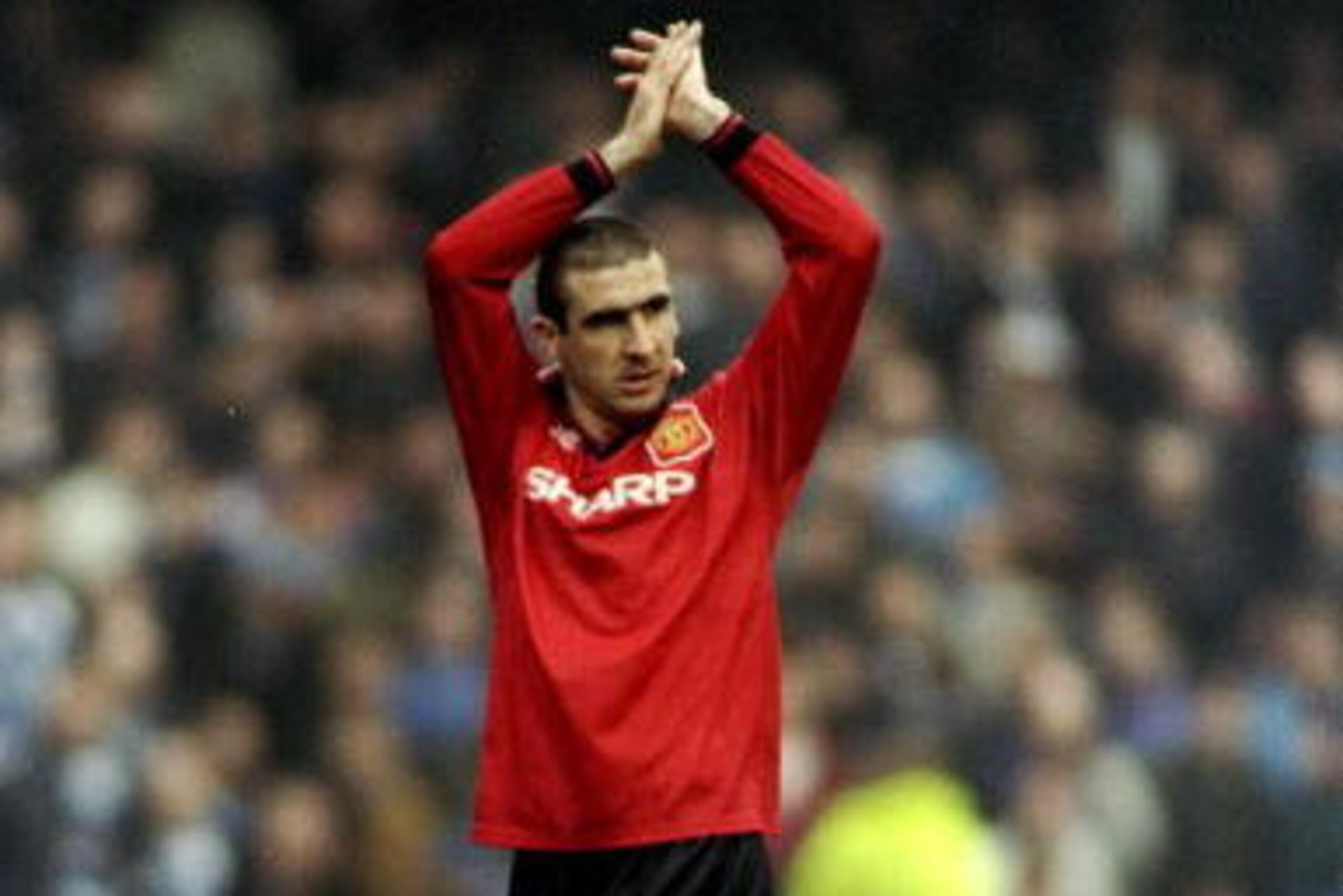 16 Mar 1996:  Eric Cantona of Manchester United applauds during an FA Carling Premiership match against Queens Park Rangers at Loftus Road in London.  \ Mandatory Credit: Mark  Thompson/Allsport