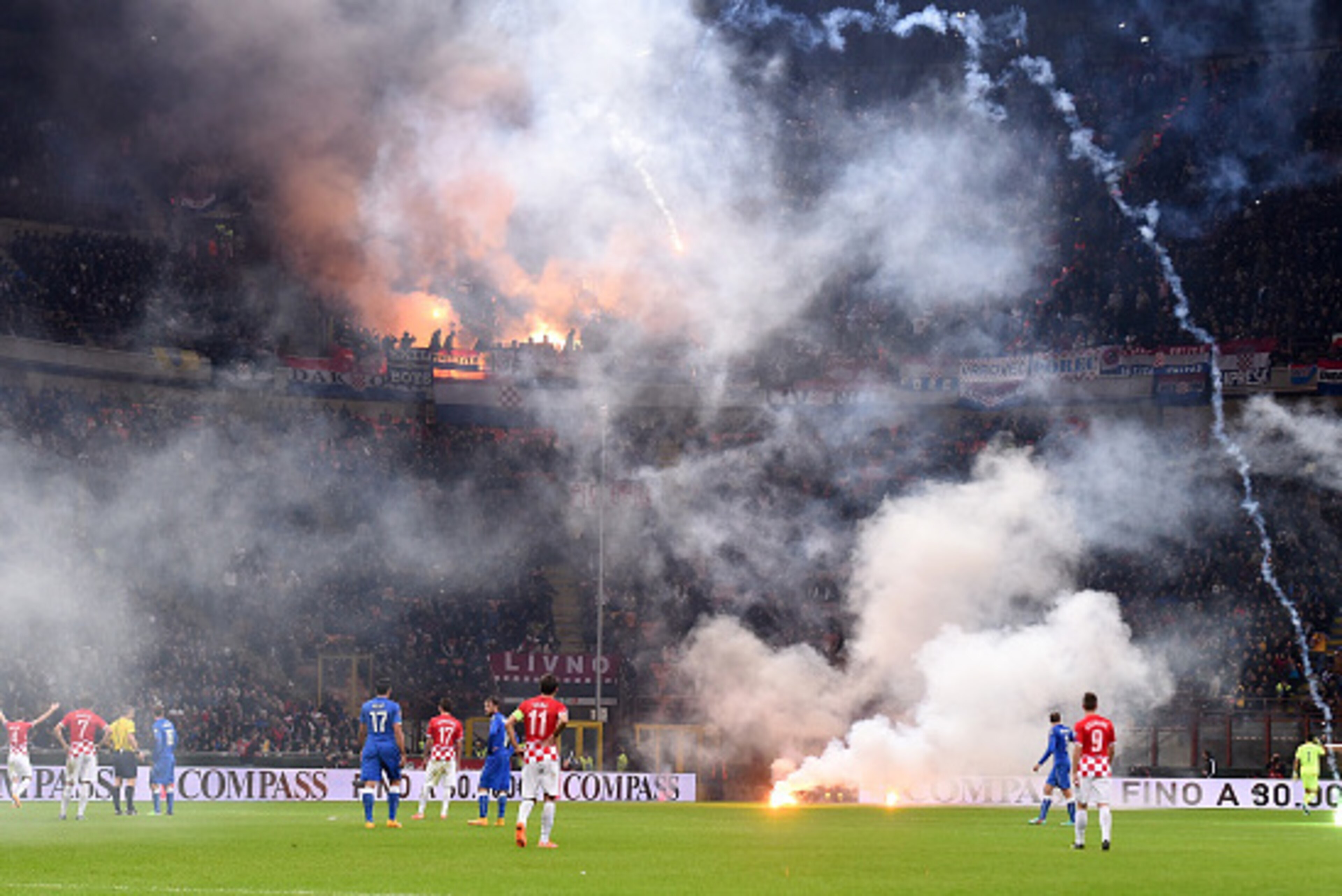 MILAN, ITALY - NOVEMBER 16: Fans of Croatia during the EURO 2016 Group H Qualifier match between Italy and Croatia at Stadio Giuseppe Meazza on November 16, 2014 in Milan, Italy. (Photo by Claudio Villa/Getty Images) MILAN, ITALY - NOVEMBER 16: Fans of Croatia during the EURO 2016 Group H Qualifier match between Italy and Croatia at Stadio Giuseppe Meazza on November 16, 2014 in Milan, Italy. (Photo by Claudio Villa/Getty Images)