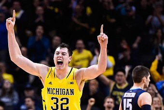 NEW YORK, NY - NOVEMBER 25:  Ricky Doyle #32 of the Michigan Wolverines celebrates a basket in the second half during a game against the Villanova Wildcats in the Progressive Legends Classic at the Barclays Center on November 25, 2014 in the Brooklyn boro