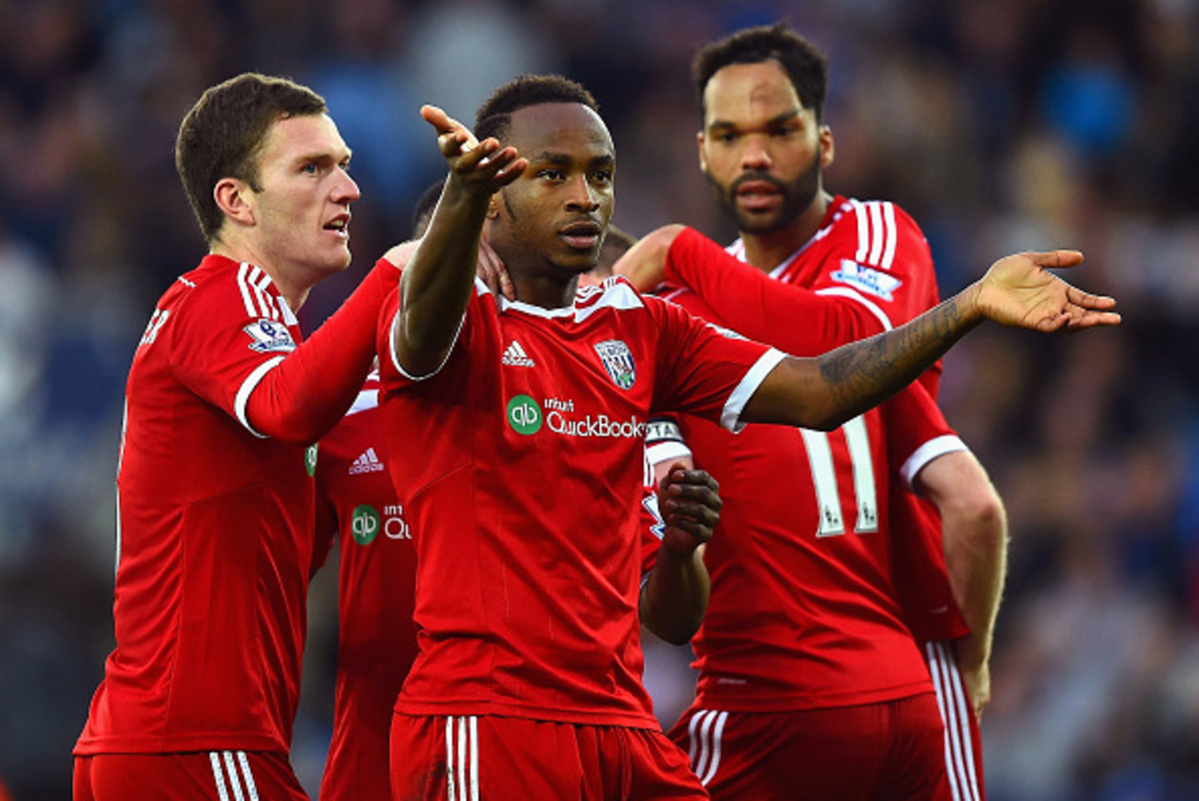 LEICESTER, ENGLAND - NOVEMBER 01: Saido Berahino of West Brom celebrates with team mates after Esteban Cambiasso of Leicester City scored an own goal during the Barclays Premier League match between Leicester City and West Bromwich Albion at The King Pow LEICESTER, ENGLAND - NOVEMBER 01: Saido Berahino of West Brom celebrates with team mates after Esteban Cambiasso of Leicester City scored an own goal during the Barclays Premier League match between Leicester City and West Bromwich Albion at The King Pow