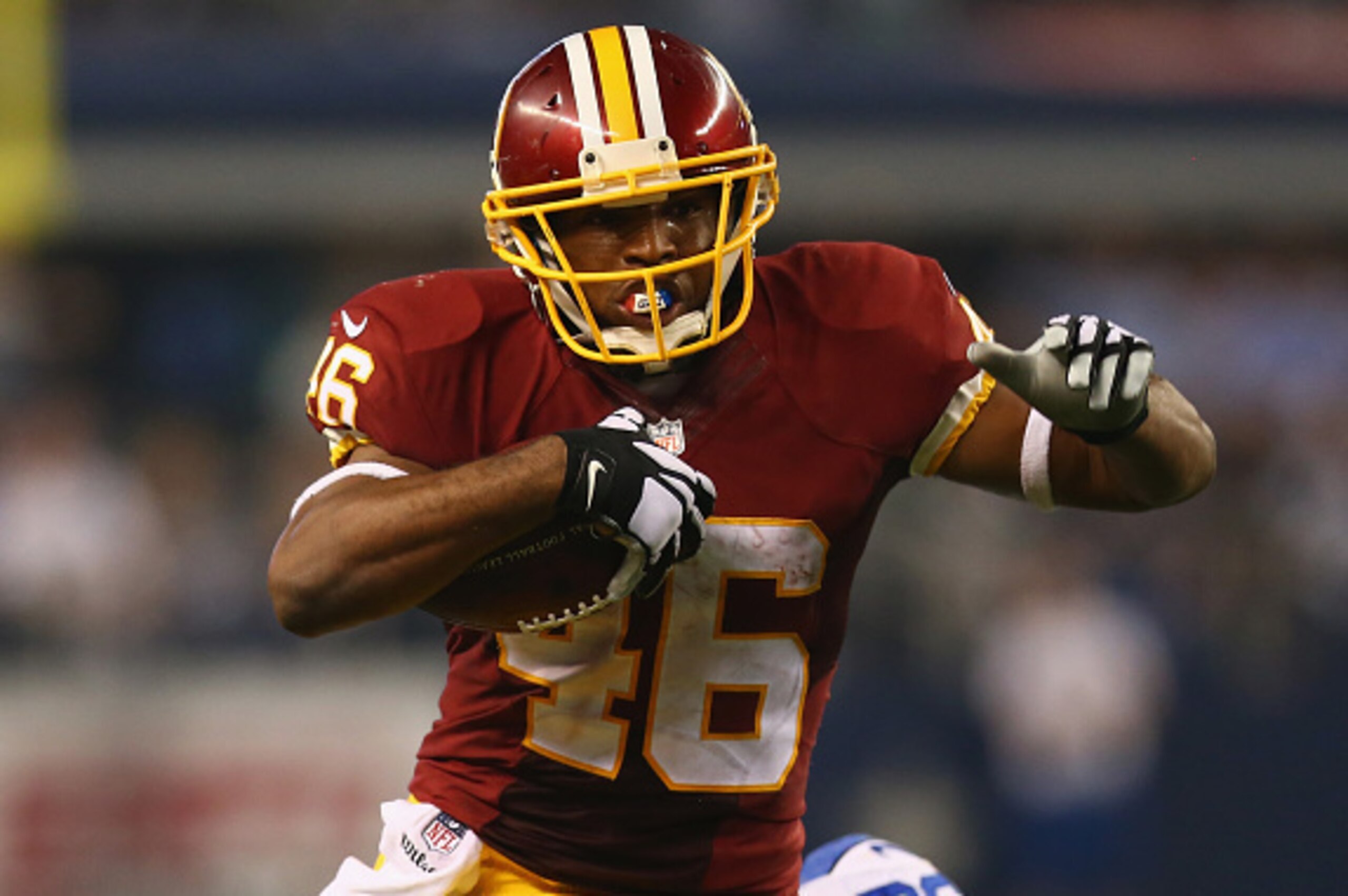 ARLINGTON, TX - OCTOBER 27:  Alfred Morris #46 of the Washington Redskins runs the ball against the Dallas Cowboys at AT&T Stadium on October 27, 2014 in Arlington, Texas.  (Photo by Ronald Martinez/Getty Images)