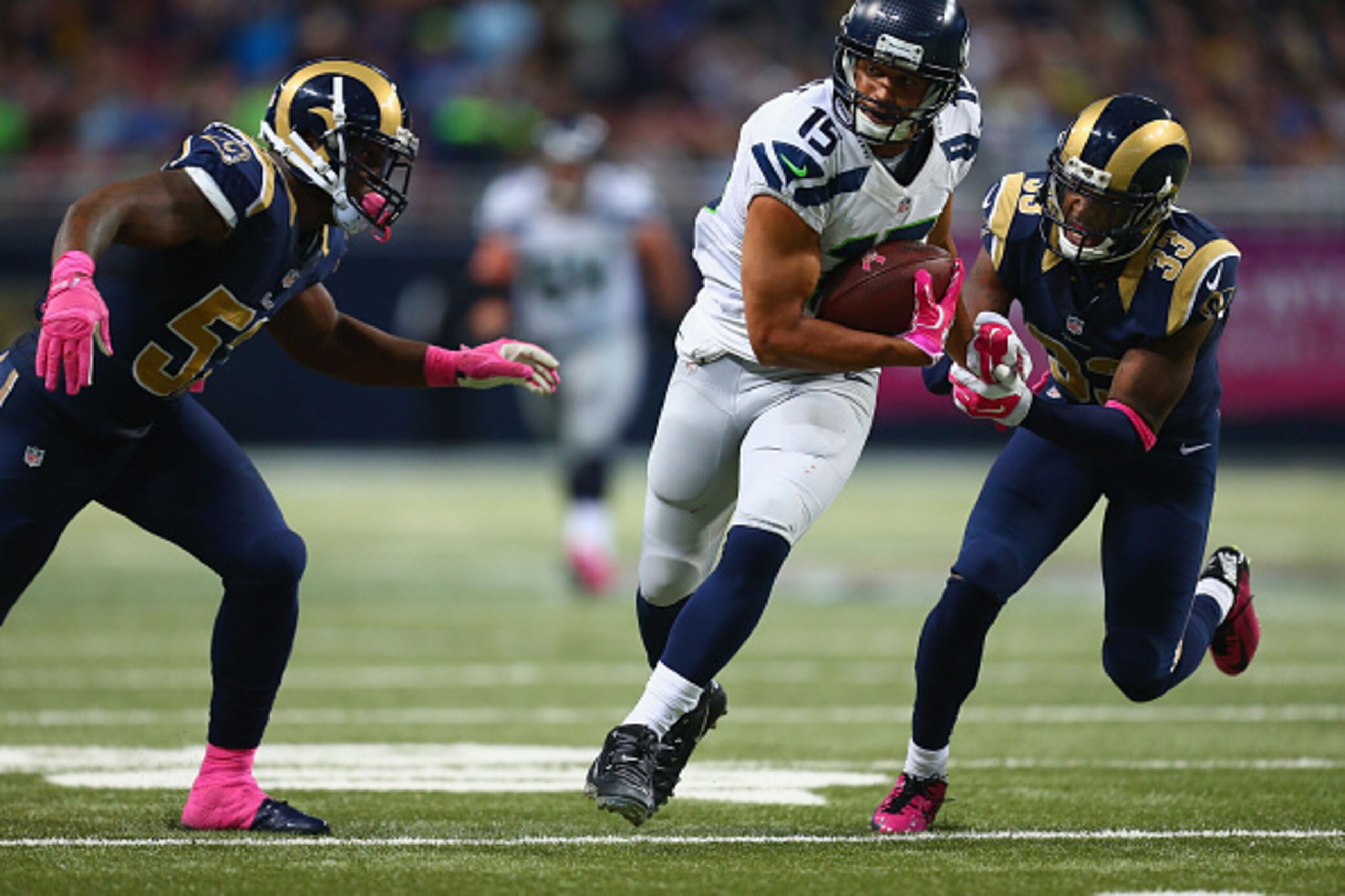 ST. LOUIS, MO - OCTOBER 19: Jermaine Kearse #15 of the Seattle Seahawks looks to get past Alec Ogletree #52 and E.J. Gaines #33 of the St. Louis Rams after making a catch in the fourth quarter at the Edward Jones Dome on October 19, 2014 in St. Louis, Mis ST. LOUIS, MO - OCTOBER 19: Jermaine Kearse #15 of the Seattle Seahawks looks to get past Alec Ogletree #52 and E.J. Gaines #33 of the St. Louis Rams after making a catch in the fourth quarter at the Edward Jones Dome on October 19, 2014 in St. Louis, Mis