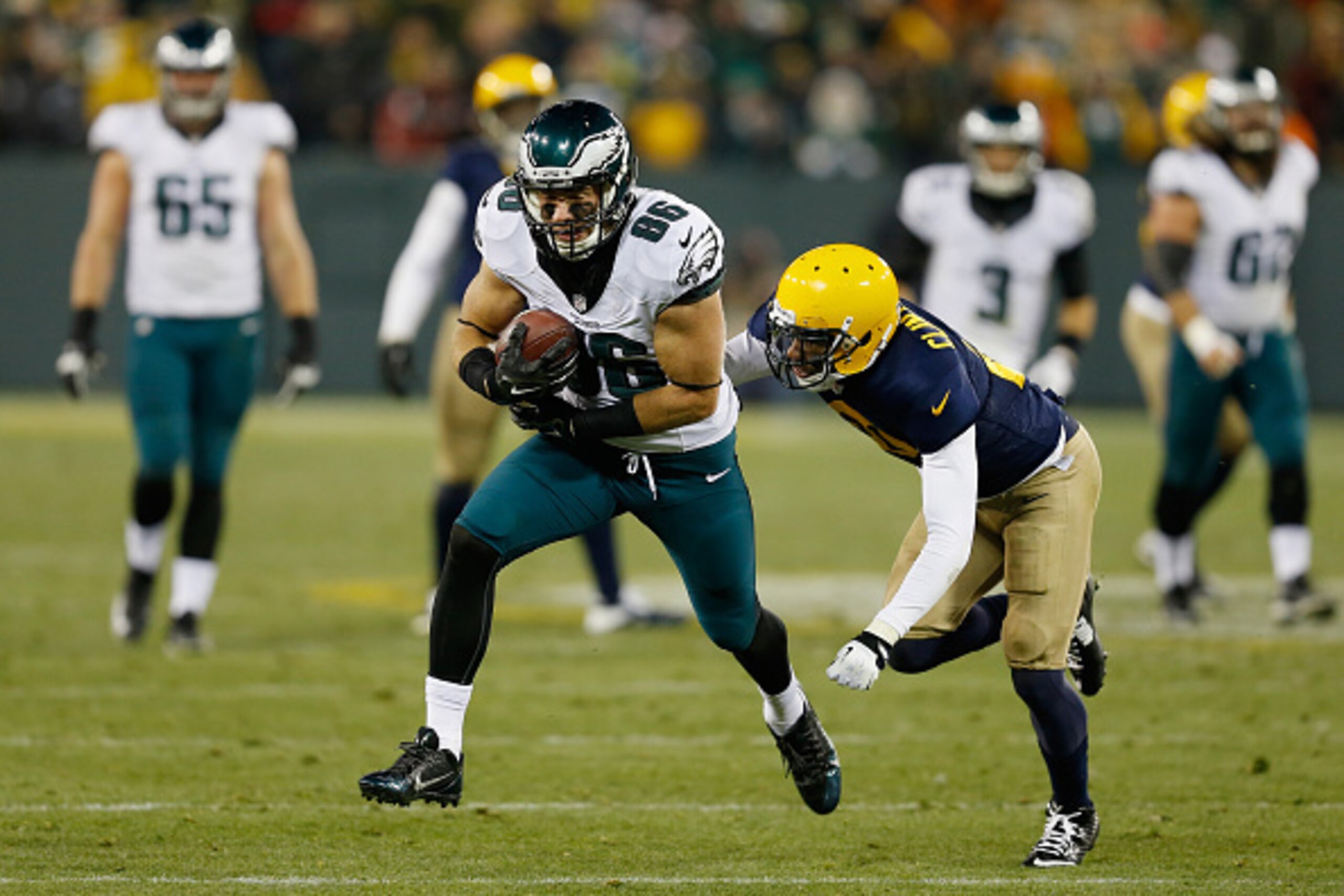 GREEN BAY, WI - NOVEMBER 16: Zach Ertz #86 of the Philadelphia Eagles is tackled by Ha Ha Clinton-Dix #21 of the Green Bay Packers during the third quarter of the game at Lambeau Field on November 16, 2014 in Green Bay, Wisconsin. (Photo by Mike Zarril GREEN BAY, WI - NOVEMBER 16: Zach Ertz #86 of the Philadelphia Eagles is tackled by Ha Ha Clinton-Dix #21 of the Green Bay Packers during the third quarter of the game at Lambeau Field on November 16, 2014 in Green Bay, Wisconsin. (Photo by Mike Zarril