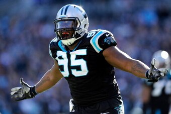 CHARLOTTE, NC - JANUARY 12: Charles Johnson #95 of the Carolina Panthers reacts after a play in the second quarter against the San Francisco 49ers during the NFC Divisional Playoff Game at Bank of America Stadium on January 12, 2014 in Charlotte, North Ca