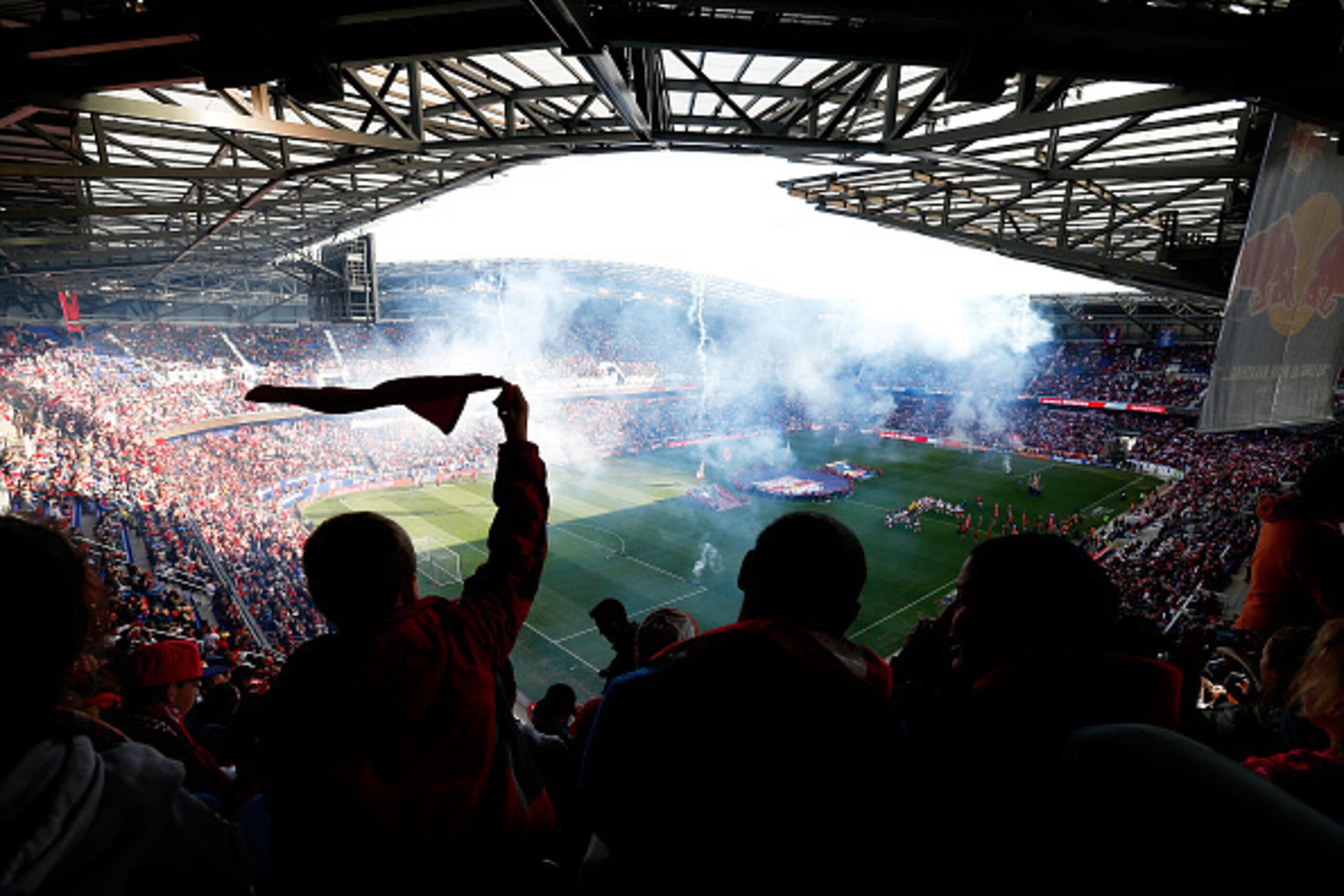 HARRISON, NJ - NOVEMBER 23:  Fans cheer during the antional anthem prior to the game between the New York Red Bulls and the New England Revolution during the Eastern Conference Final - Leg 1 at Red Bull Arena on November 23, 2014 in Harrison, New Jersey. 