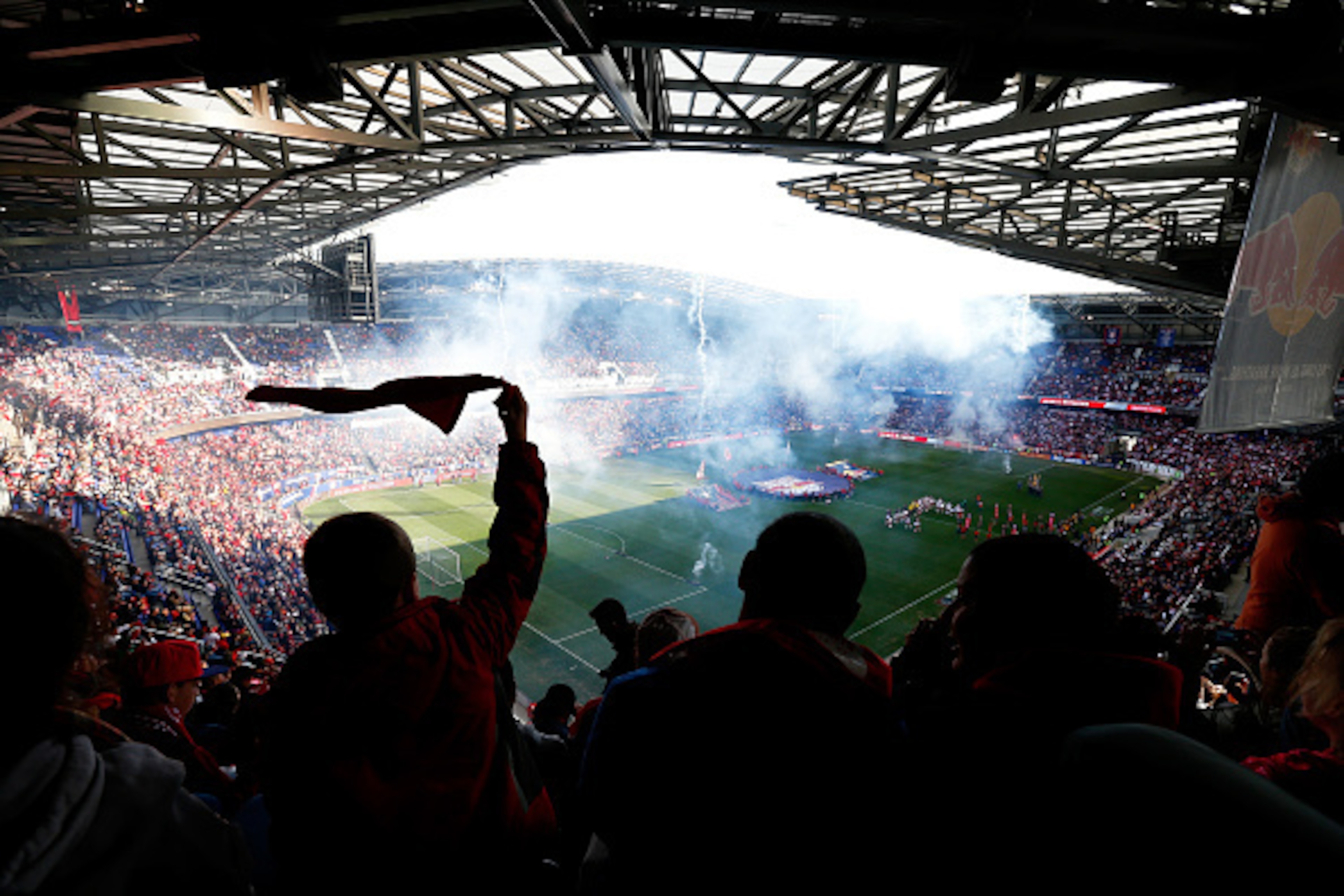 HARRISON, NJ - NOVEMBER 23:  Fans cheer during the antional anthem prior to the game between the New York Red Bulls and the New England Revolution during the Eastern Conference Final - Leg 1 at Red Bull Arena on November 23, 2014 in Harrison, New Jersey. 