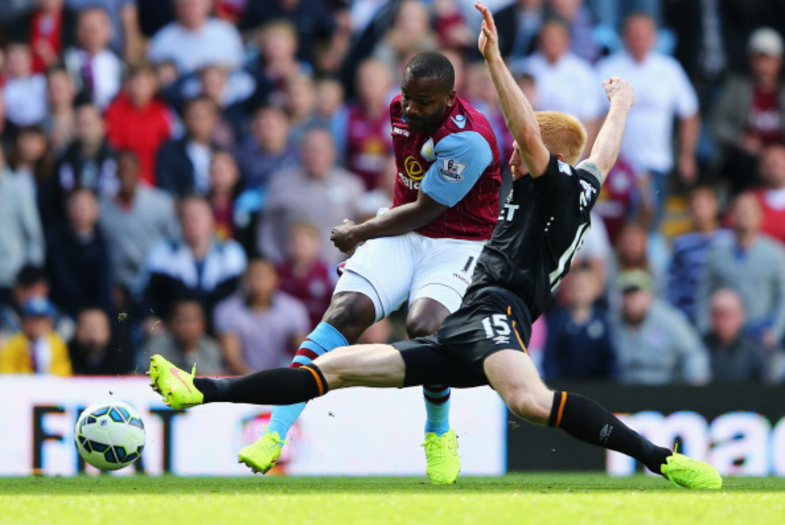 BIRMINGHAM, ENGLAND - AUGUST 31: Darren Bent of Aston Villa fails to score under a challenge by Paul McShane of Hull City during the Barclays Premier League match between Aston Villa and Hull City at Villa Park on August 31, 2014 in Birmingham, England. BIRMINGHAM, ENGLAND - AUGUST 31: Darren Bent of Aston Villa fails to score under a challenge by Paul McShane of Hull City during the Barclays Premier League match between Aston Villa and Hull City at Villa Park on August 31, 2014 in Birmingham, England.