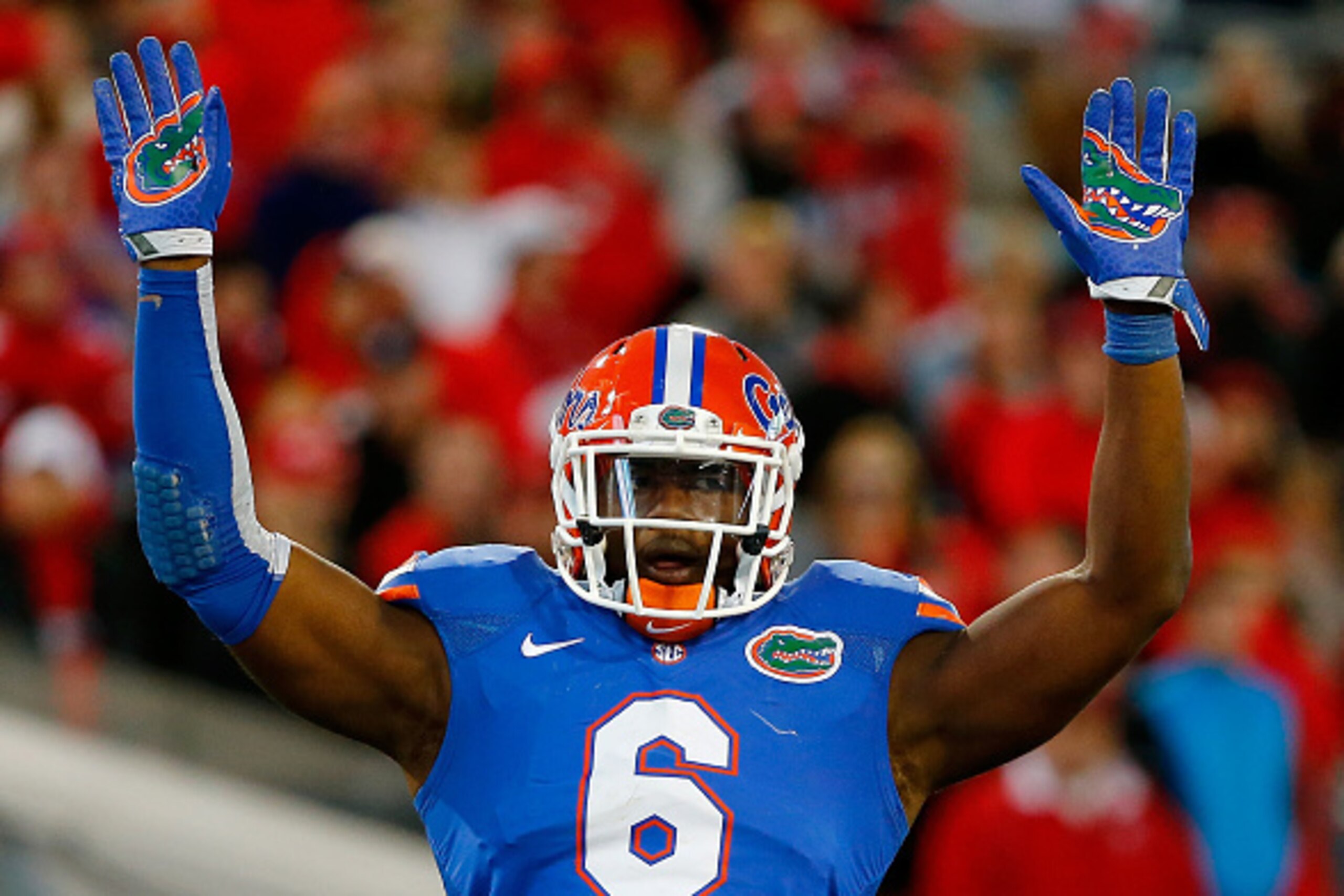 JACKSONVILLE, FL - NOVEMBER 01:  Dante Fowler #6 of the Florida Gators asks the crowd for noise during the game against the Georgia Bulldogs at EverBank Field on November 1, 2014 in Jacksonville, Florida.  (Photo by Sam Greenwood/Getty Images)