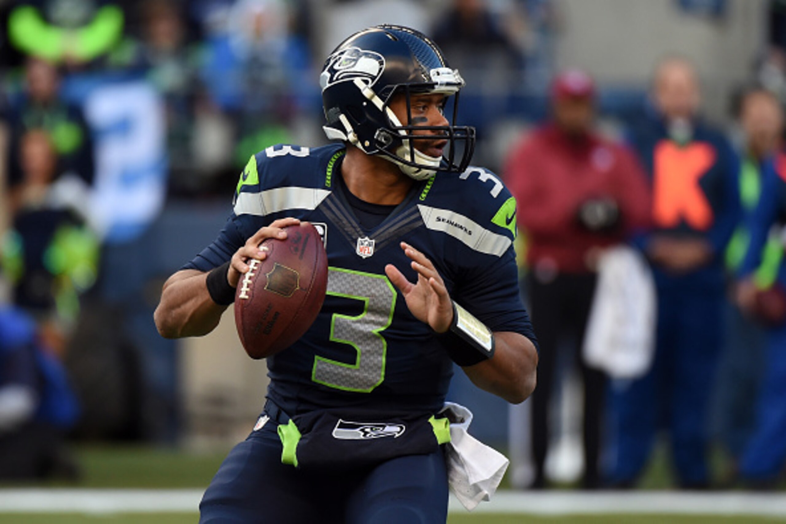 SEATTLE, WA - NOVEMBER 23:  Russell Wilson #3 of the Seattle Seahawks throws a pass against the Arizona Cardinals during their game at CenturyLink Field on November 23, 2014 in Seattle, Washington.  (Photo by Steve Dykes/Getty Images)