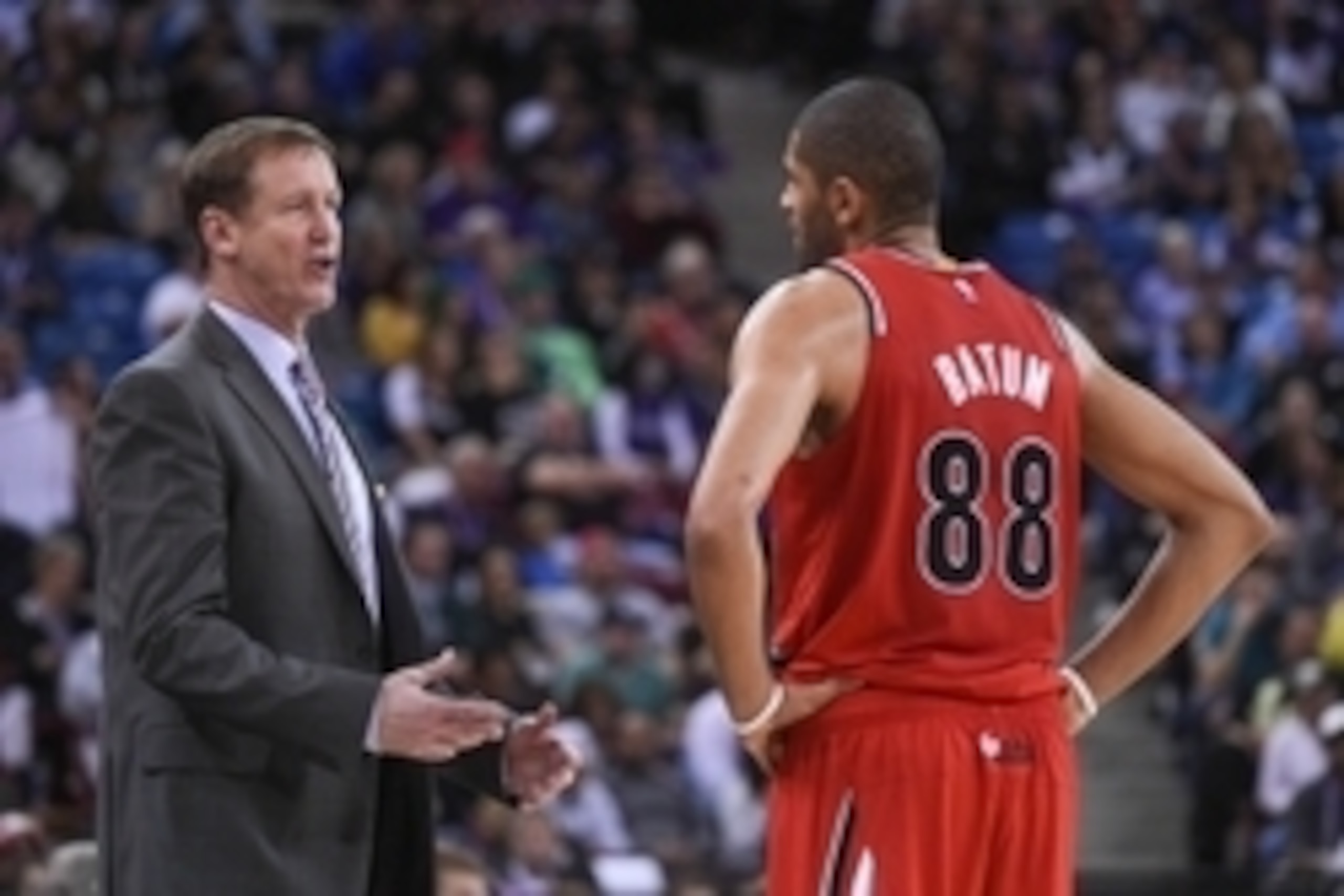 October 31, 2014; Sacramento, CA, USA; Portland Trail Blazers head coach Terry Stotts (left) instructs forward Nicolas Batum (88) during the third quarter against the Sacramento Kings at Sleep Train Arena. The Kings defeated the Trail Blazers 103-94. Mand