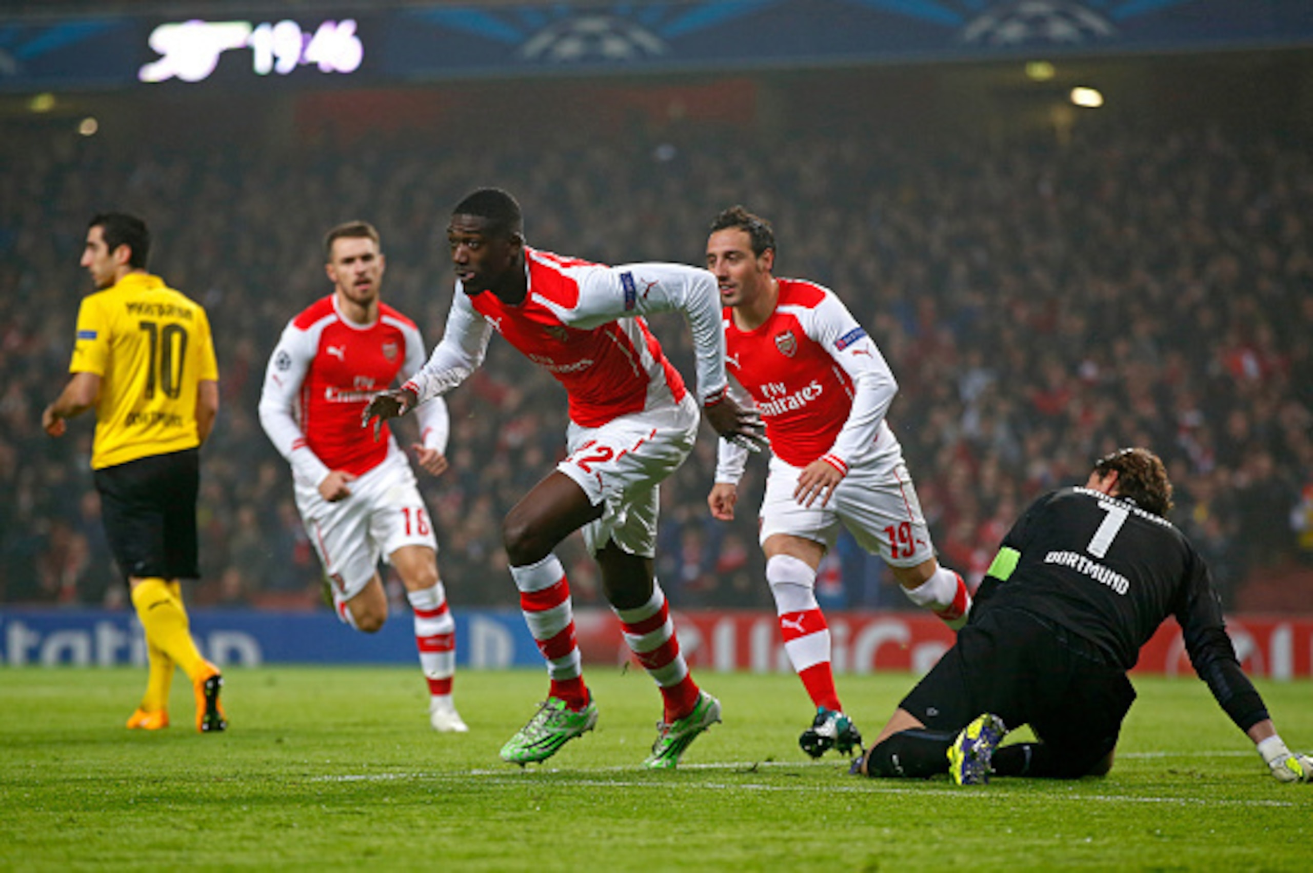 LONDON, ENGLAND - NOVEMBER 26:  Yaya Sanogo of Arsenal celebrates after scoring the opening goal during the UEFA Champions League Group D match between Arsenal and Borussia Dortmund at the Emirates Stadium on November 26, 2014 in London, United Kingdom.  