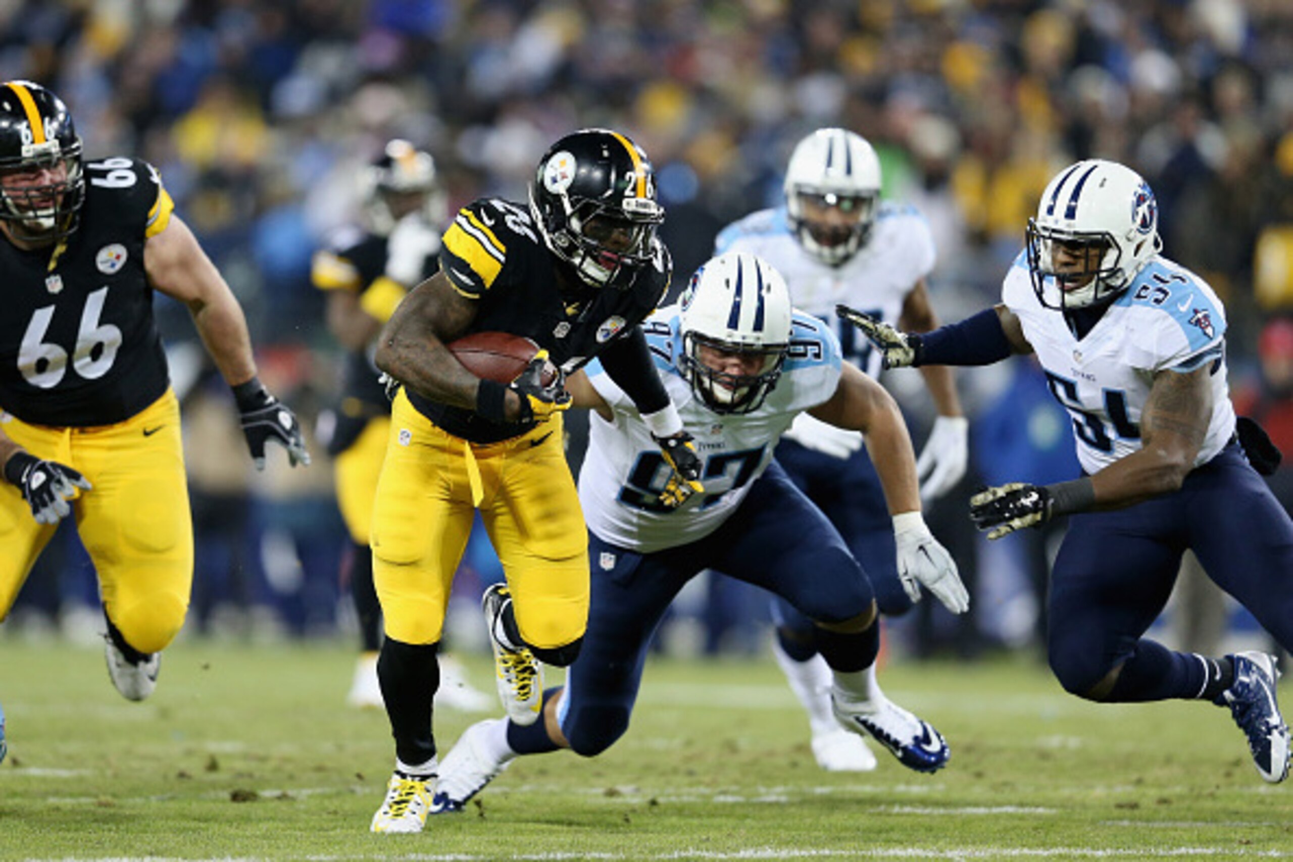 NASHVILLE, TN - NOVEMBER 17:   Karl Klug #97 and  Avery Williamson #54 of the Tennessee Titans looks to tackle  Le'Veon Bell #26 of the Pittsburgh Steelers in the first quarter at LP Field on November 17, 2014 in Nashville, Tennessee.  (Photo by Andy Lyon