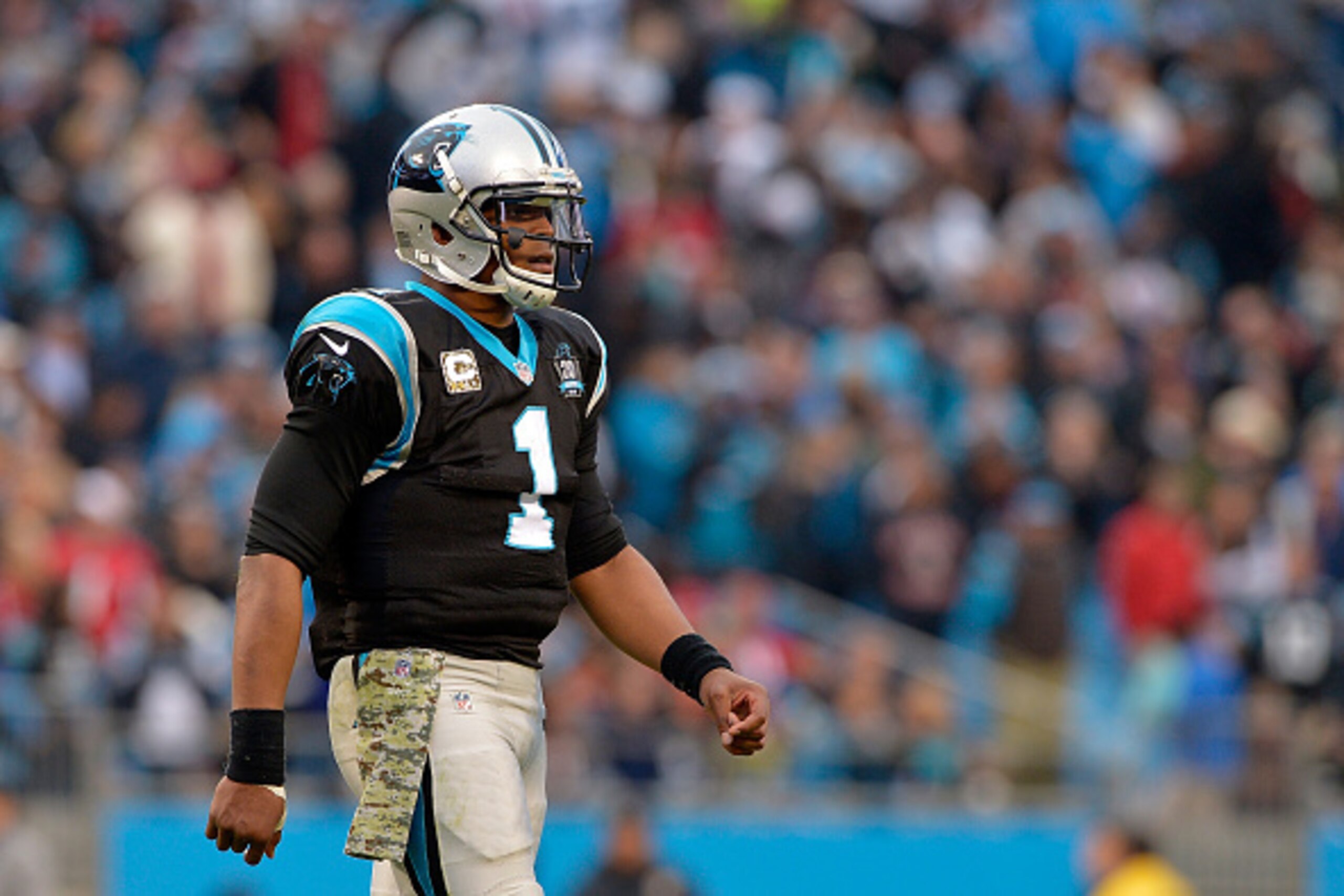 CHARLOTTE, NC - NOVEMBER 16:  Cam Newton #1 of the Carolina Panthers leaves the field after a 19-17 loss to the Atlant Falcons at Bank of America Stadium on November 16, 2014 in Charlotte, North Carolina.  (Photo by Grant Halverson/Getty Images)