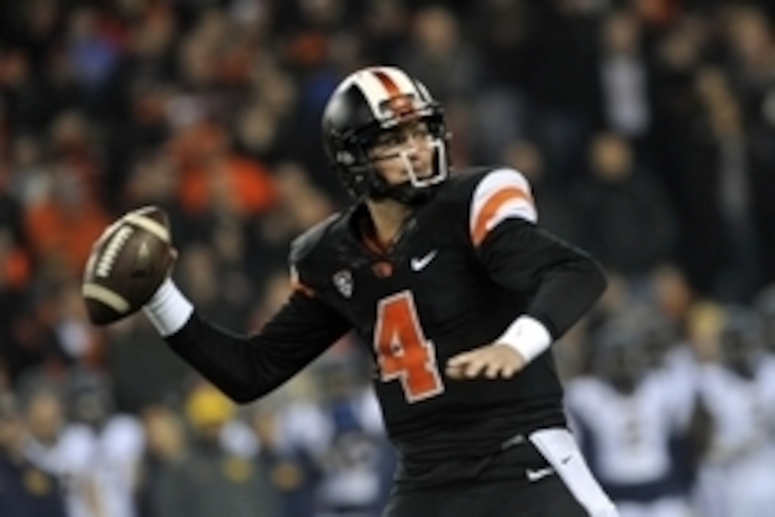 Nov 1, 2014; Corvallis, OR, USA; Oregon State Beavers quarterback Sean Mannion (4) throws during the game at Reser Stadium. He broke the all time Pac-12 passing record in the loss to the California Golden Bears 45-31.Mandatory Credit: Susan Ragan-USA TODA