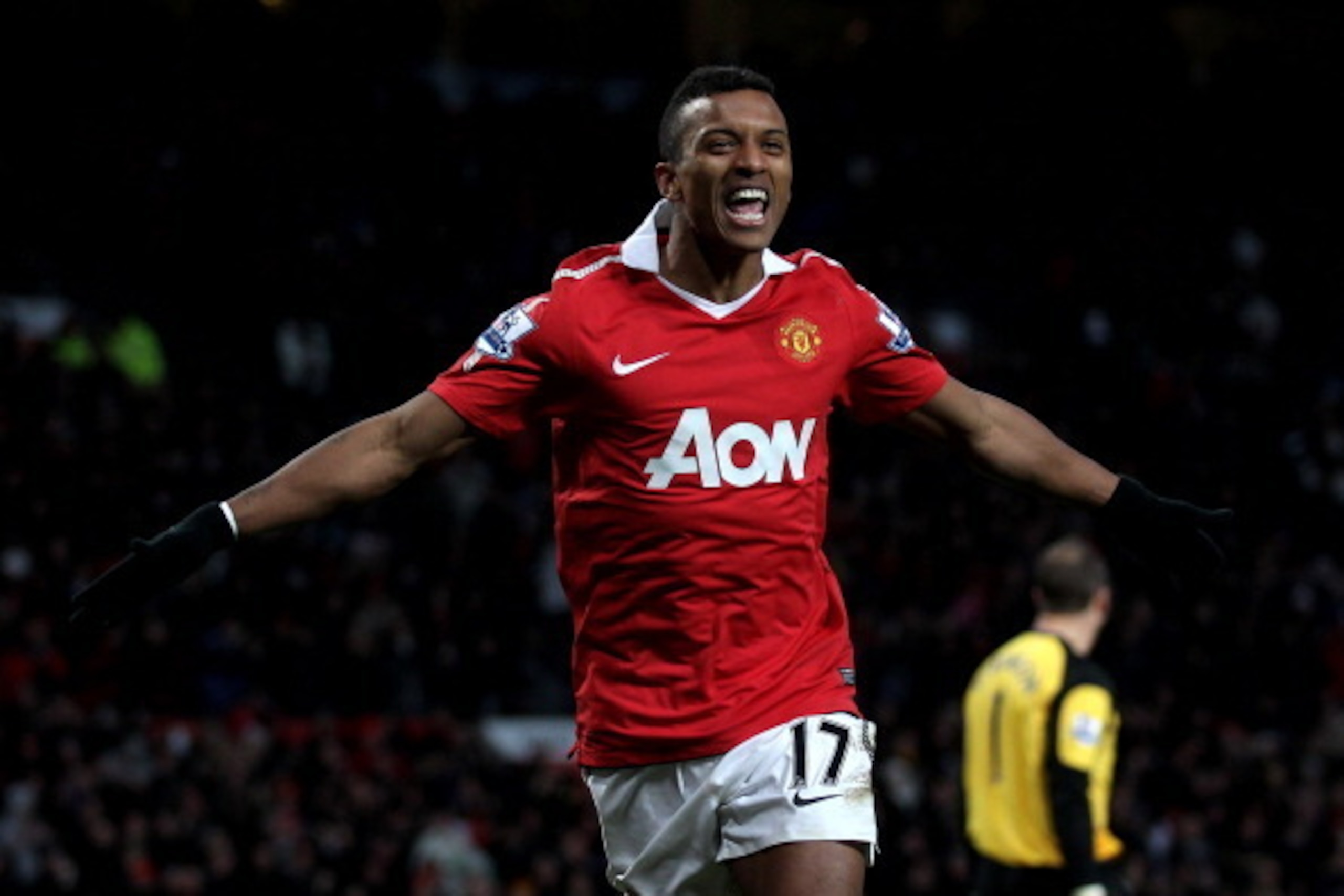 MANCHESTER, ENGLAND - NOVEMBER 27:  Nani of Manchester United celebrates scoring his team's fifth goal during the Barclays Premier League match between Manchester United and Blackburn Rovers at Old Trafford on November 27, 2010 in Manchester, England.  (P