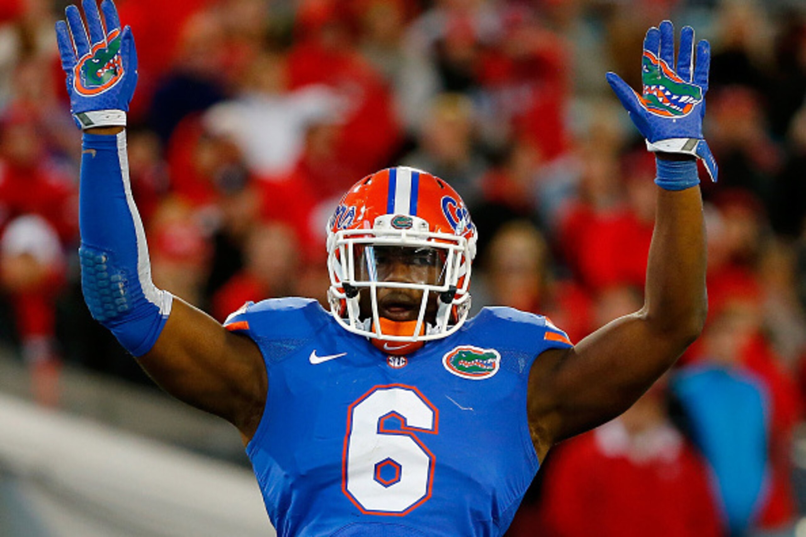 JACKSONVILLE, FL - NOVEMBER 01:  Dante Fowler #6 of the Florida Gators asks the crowd for noise during the game against the Georgia Bulldogs at EverBank Field on November 1, 2014 in Jacksonville, Florida.  (Photo by Sam Greenwood/Getty Images)