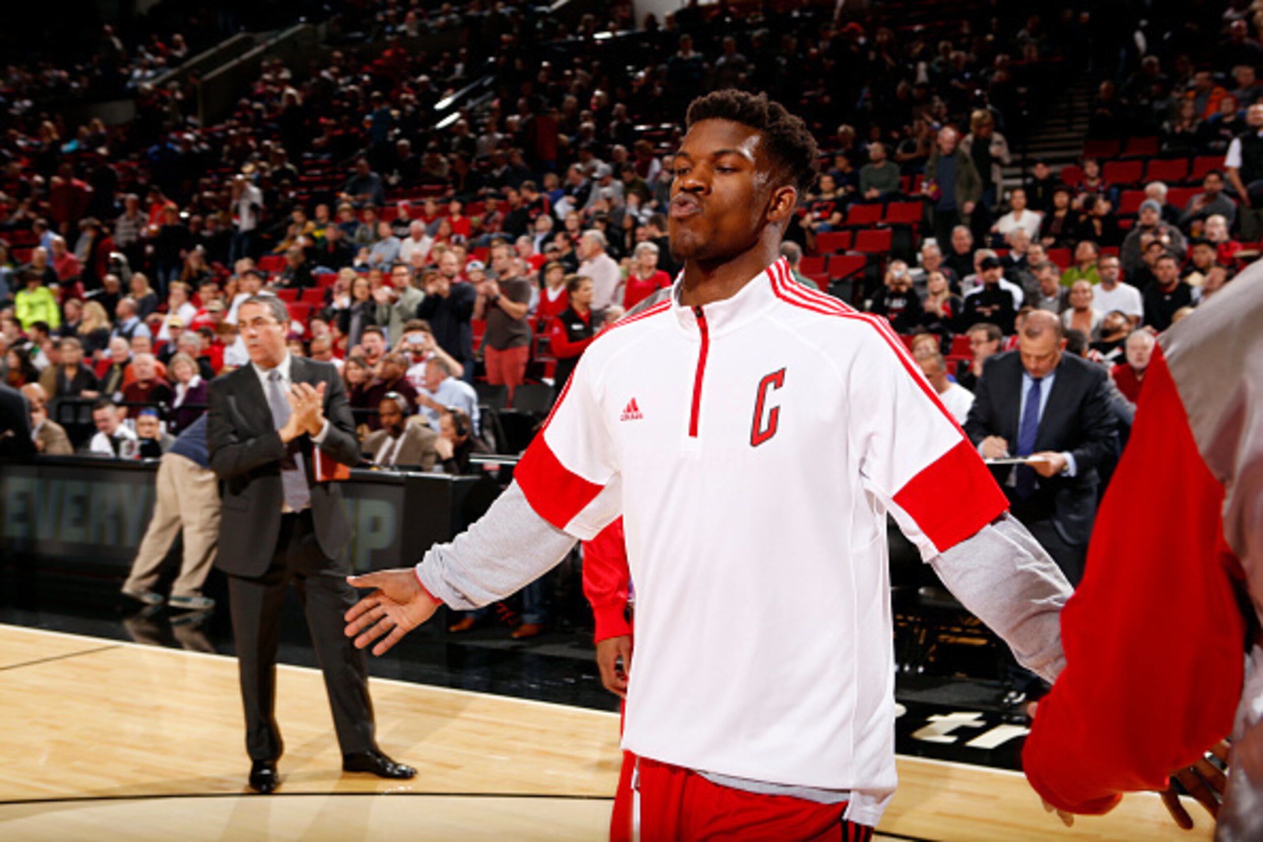 PORTLAND, OR - NOVEMBER 21: Jimmy Butler #21 of the Chicago Bulls gets introduced before a game against the Portland Trail Blazers on November 21, 2014 at the Moda Center Arena in Portland, Oregon. NOTE TO USER: User expressly acknowledges and agrees that