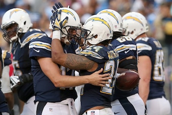SAN DIEGO, CA - NOVEMBER 23:  Quarterback Philip Rivers #17 and running back Ryan Matthews #24 of the San Diego Chargers celebrate after the final down against the St. Louis Rams at Qualcomm Stadium on November 23, 2014 in San Diego, California.  The Char
