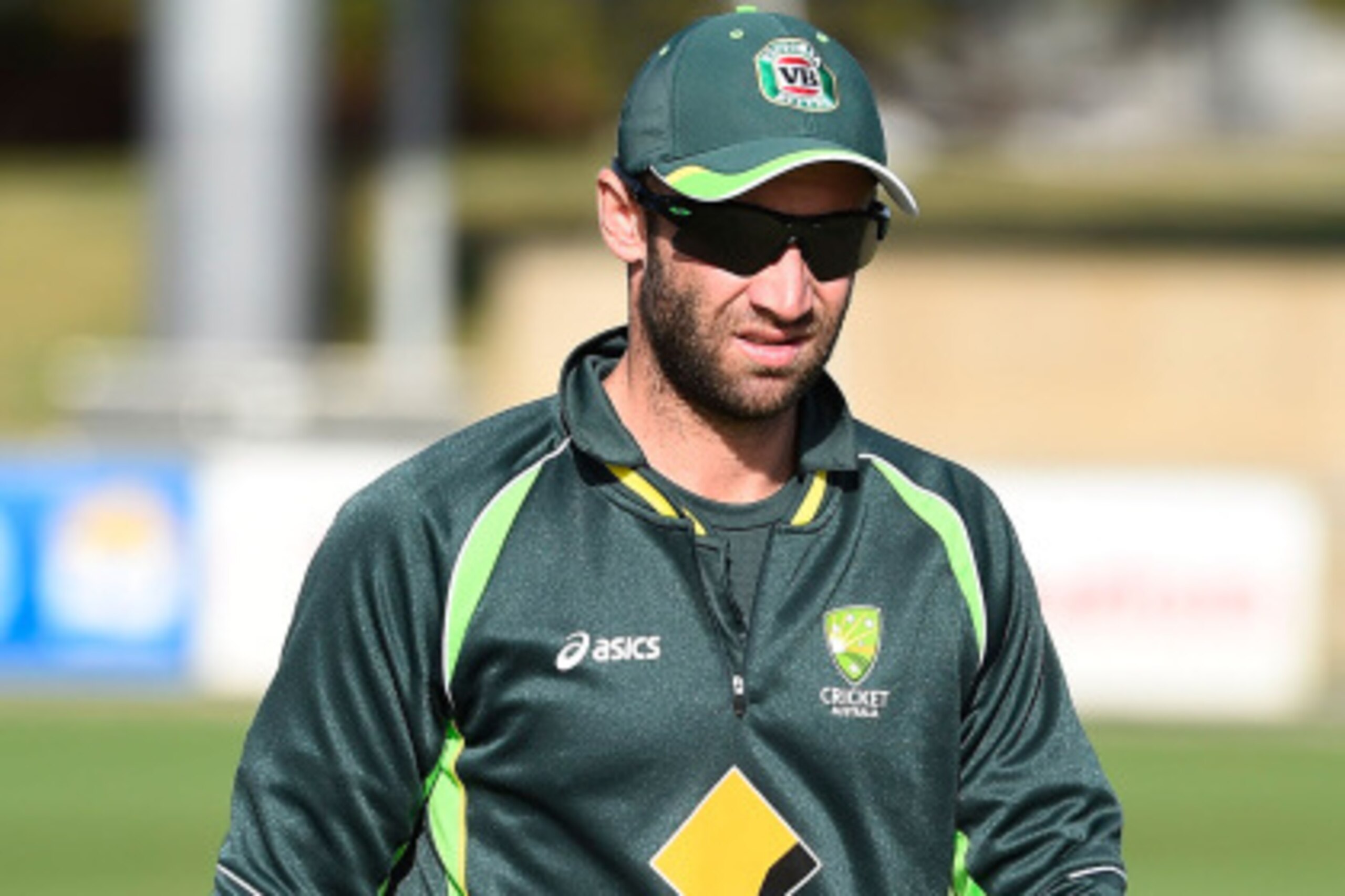 TOWNSVILLE, AUSTRALIA - AUGUST 07:  Phil Hughes of Australia 'A' looks on during the warm up beofre the start of the match between Australia 'A' and South Africa 'A' at Tony Ireland Stadium on August 7, 2014 in Townsville, Australia.  (Photo by Ian Hitchc