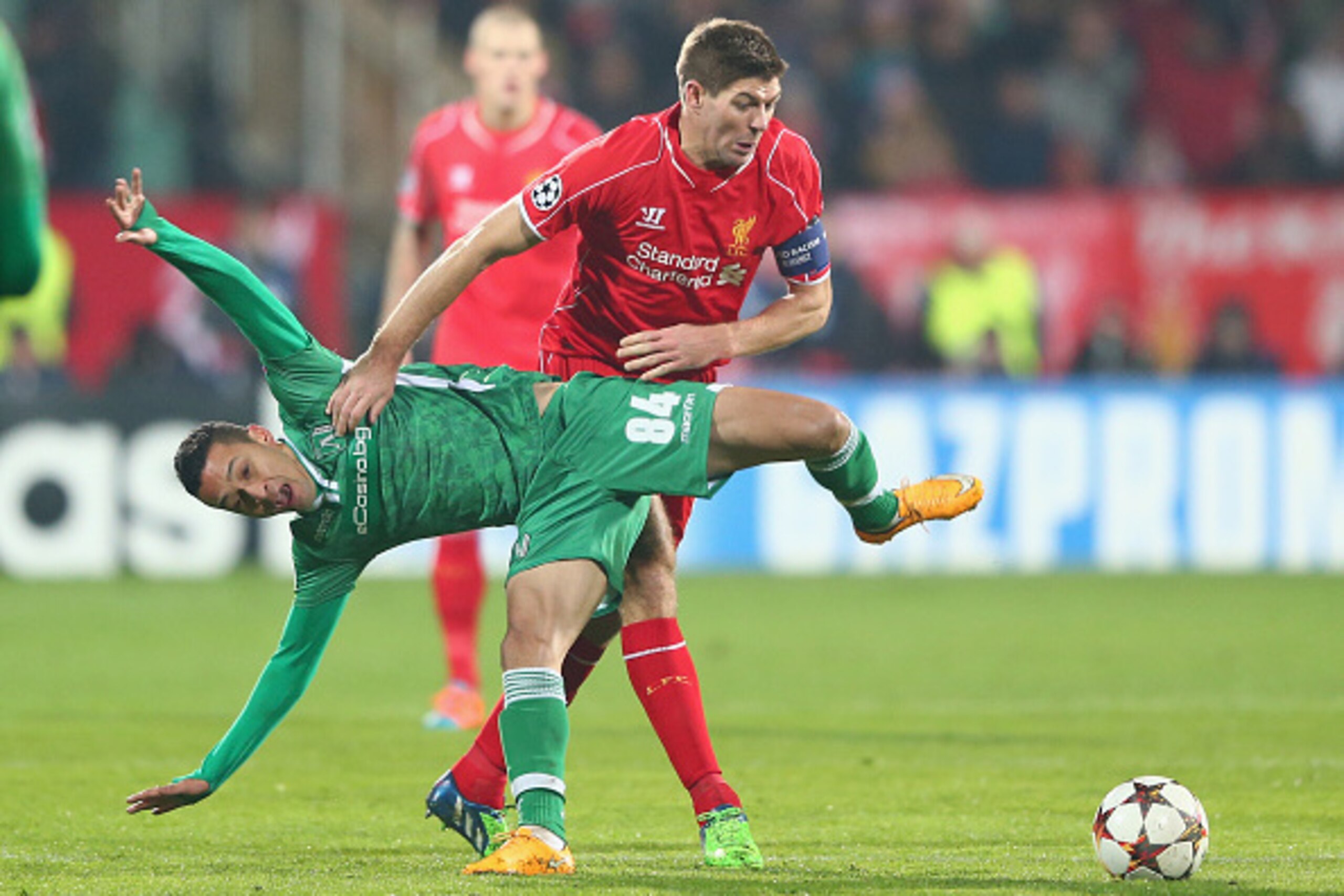 SOFIA, BULGARIA - NOVEMBER 26: Marcelinho (L) of  Ludogerets loses out to Steven Gerrard of Liverpool during the UEFA Champions League Group B match between Ludogorets Razgrad and Liverpool at the Vasil Levski Stadium on November 26, 2014 in Sofia, Bulgar