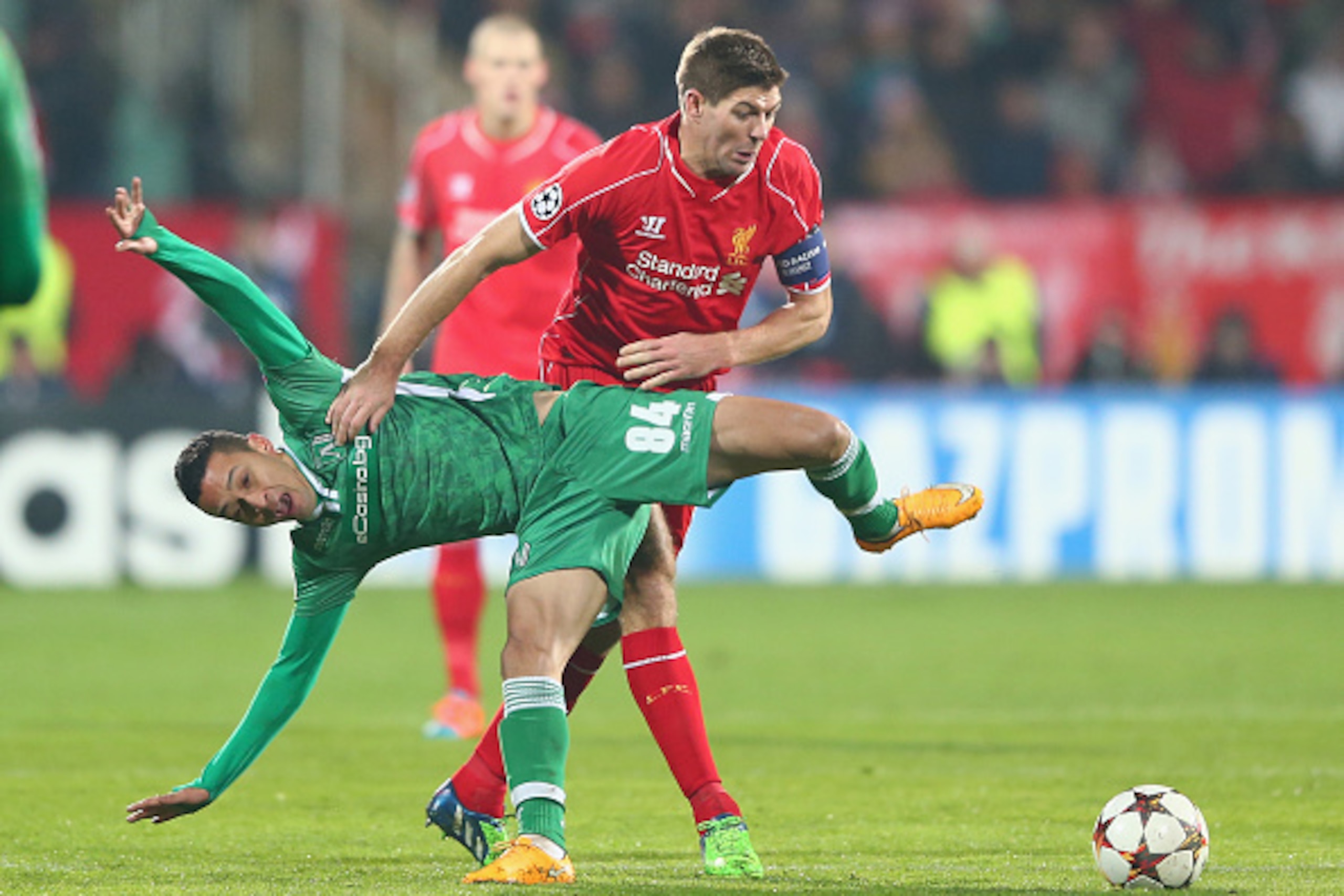 SOFIA, BULGARIA - NOVEMBER 26: Marcelinho (L) of  Ludogerets loses out to Steven Gerrard of Liverpool during the UEFA Champions League Group B match between Ludogorets Razgrad and Liverpool at the Vasil Levski Stadium on November 26, 2014 in Sofia, Bulgar